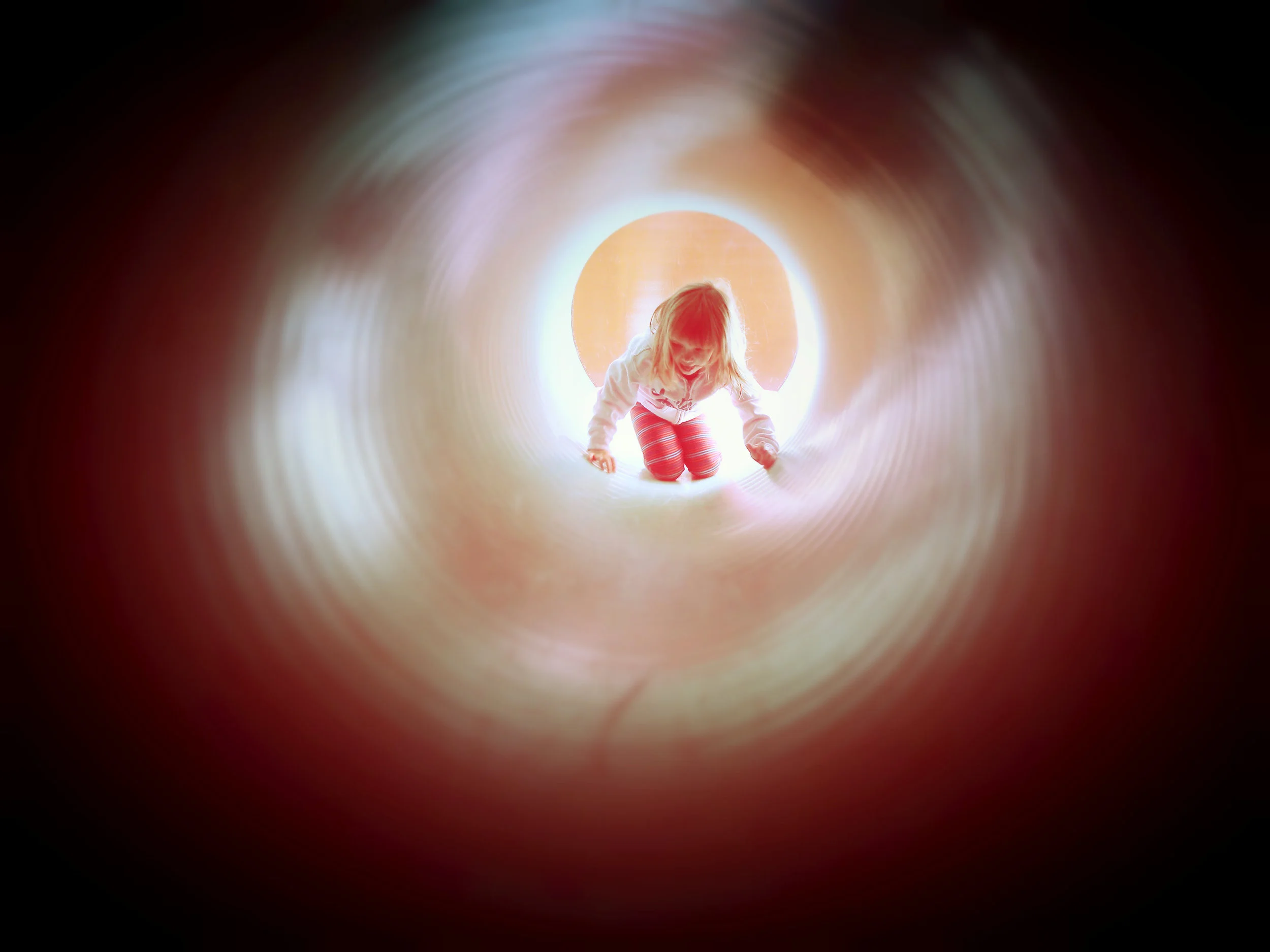 girl in tube tunnel.jpg