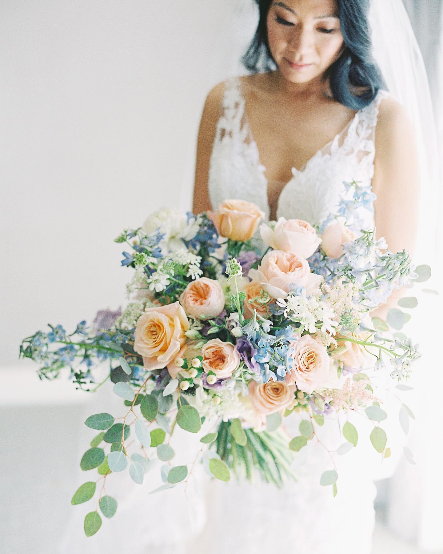This lavish bouquet in coral, pale blue and lavender hues just might be our new favorite color combo. 
Floral: @festivestl 
Planning: @kateandcompany 
Photo: @clarypfeiffer 
Venue: @ritzcarltonstlouis 
Beauty: @daniellestyle 
Ceremony music: @contemp