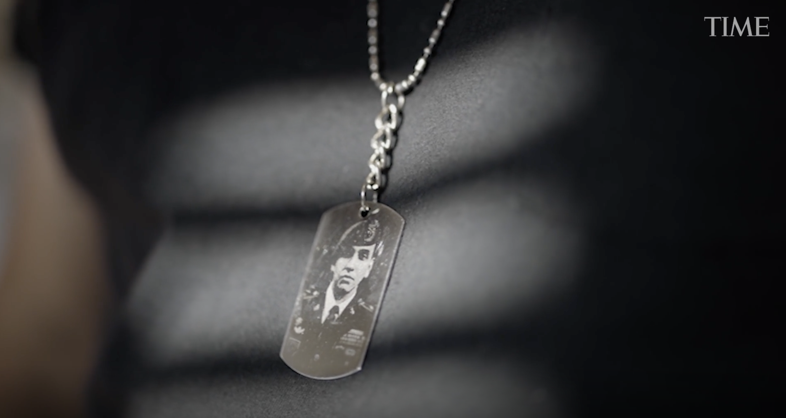 Sergeant First Class Javier Jaguar Gutierrez is buried in Grave 104B of Section 14A at the Fort Sam Houston National Cemetery in San Antonio. The white marble headstone is shaded by a willowy oak and adorned with a miniature American flag and a fistf