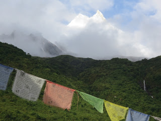 Manaslu peaks through the clouds