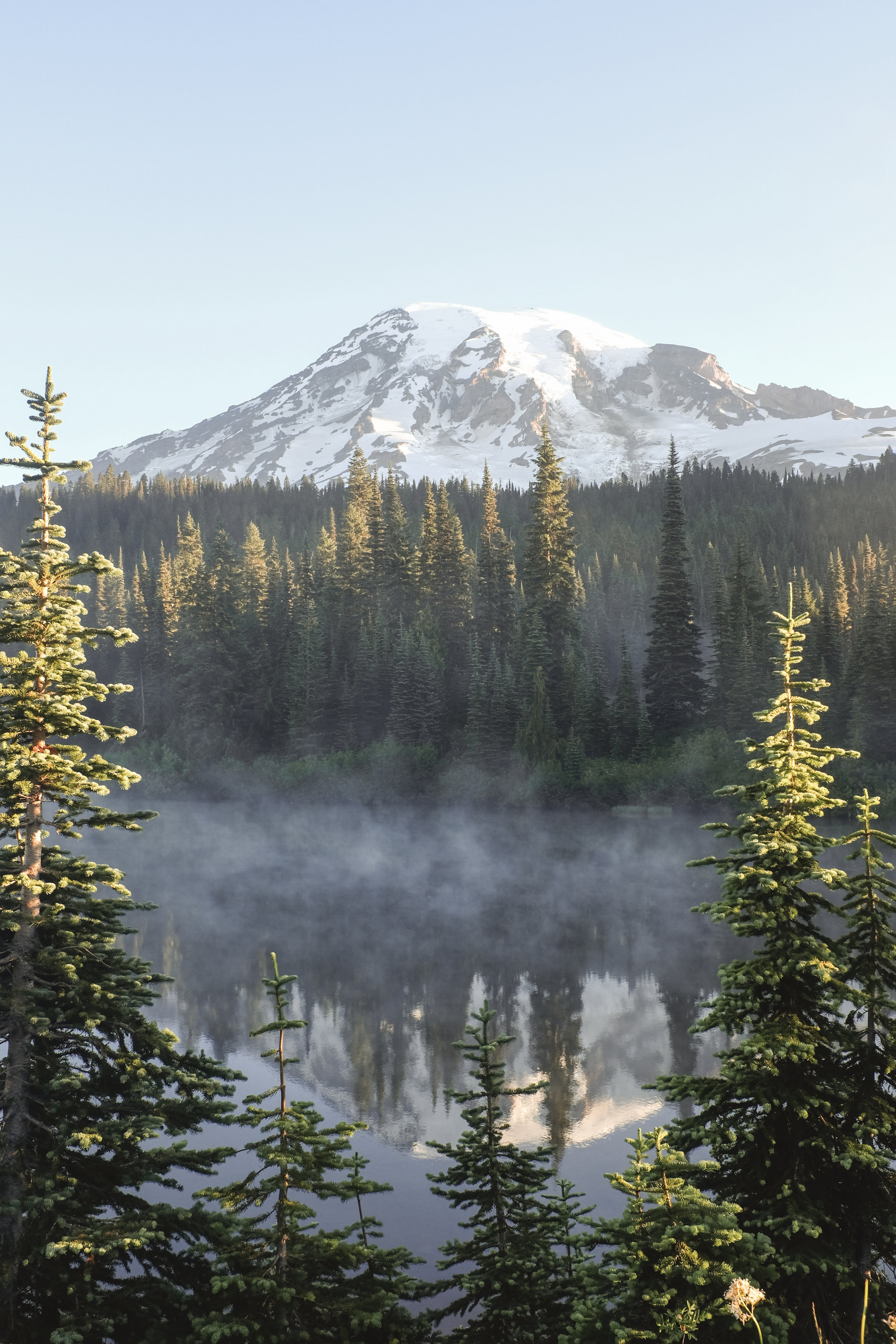 Early morning fog on the lake in Mt Rainier National Park, Washington