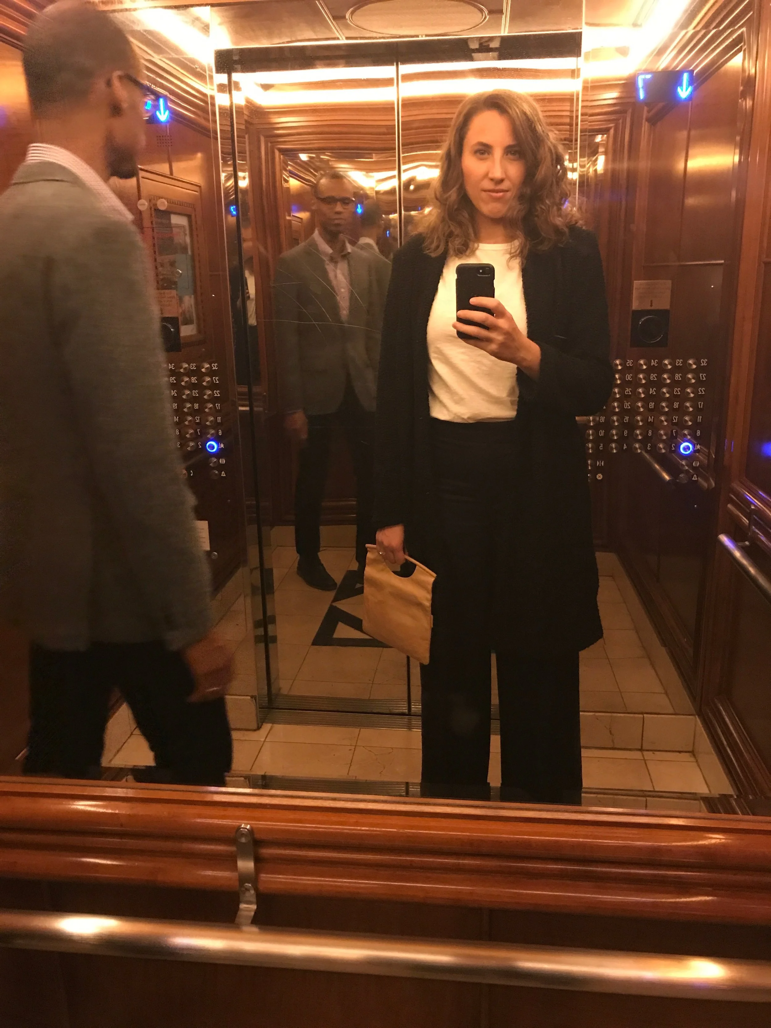 Emi & her husband Steve in a fancy NYC elevator en route to a documentary premiere no doubt...