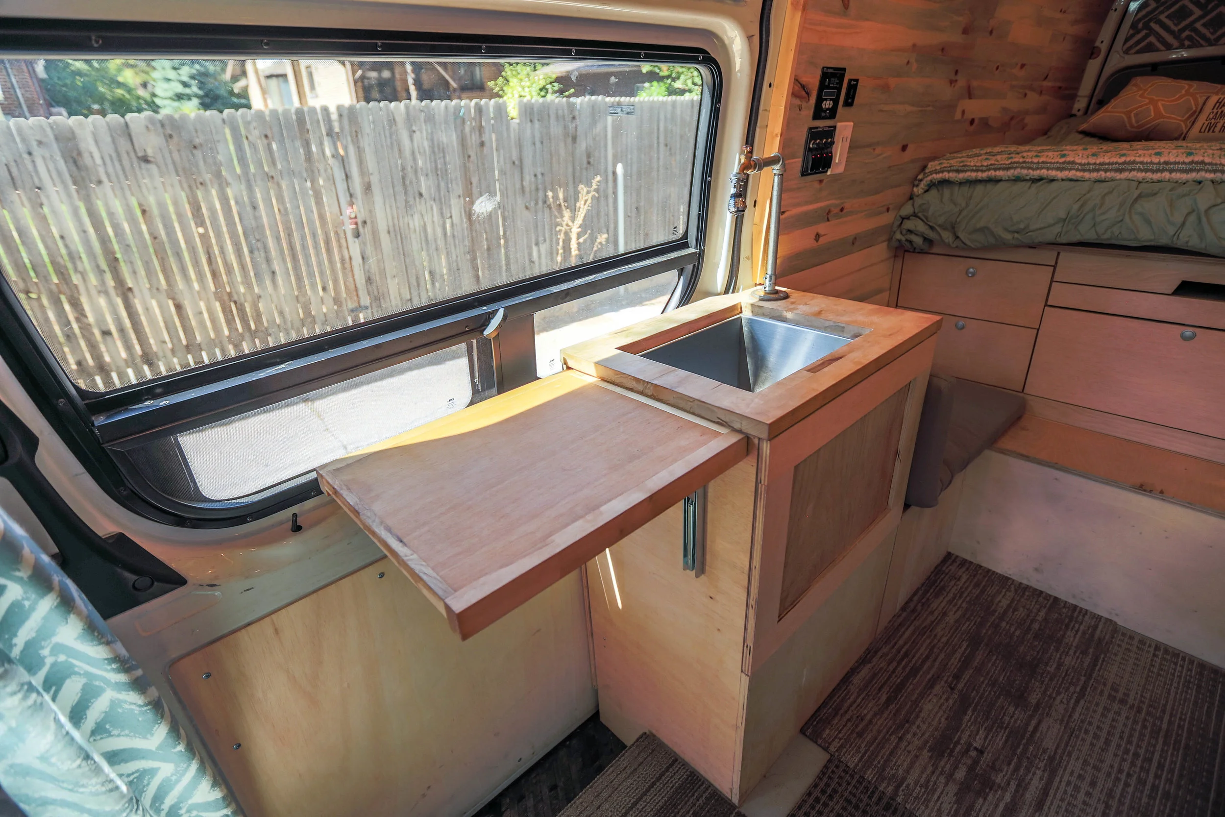 A fold out section of the kitchenette offers more counter space and helps create a more comfortable feel. It also comes with a view! 