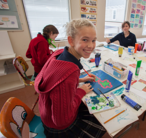 Elizabeth painting in art class at Montrose School.