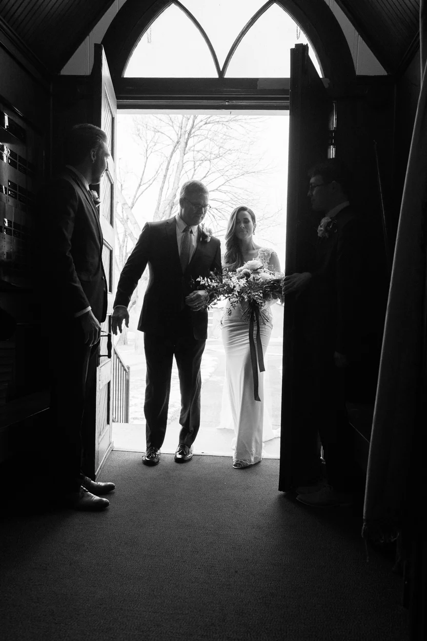 The bride arrives at the Poker Church in Cody, Wy.