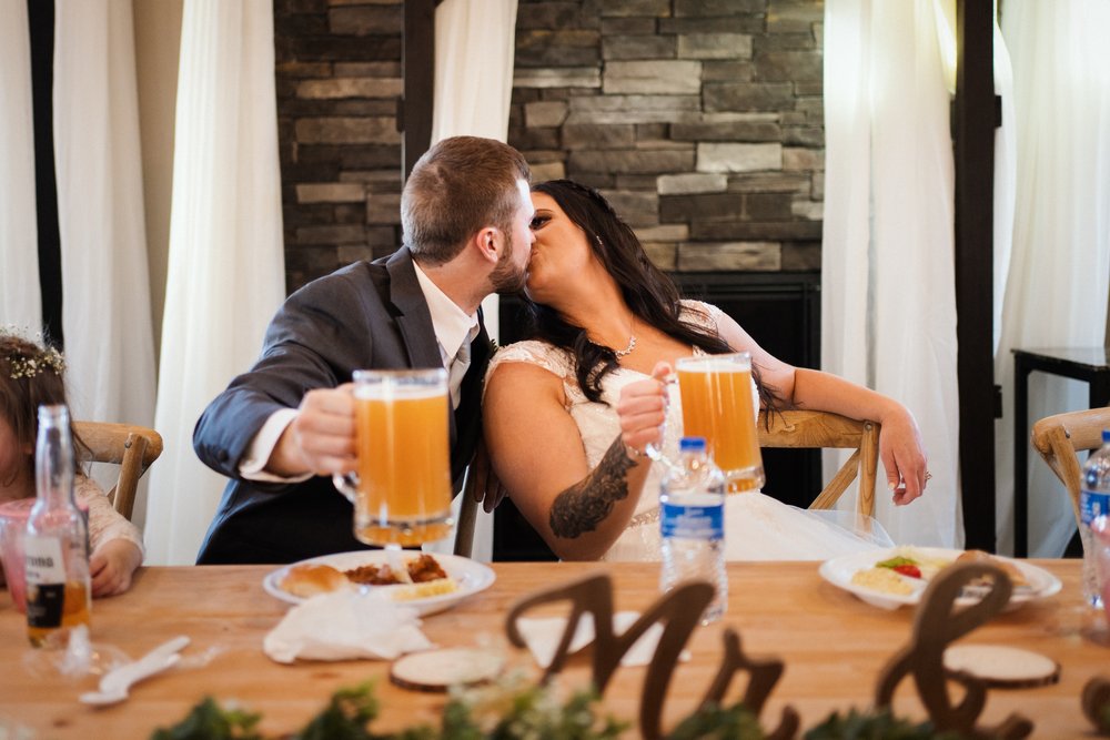 Bride and Groom kiss at Camelot Ranch.