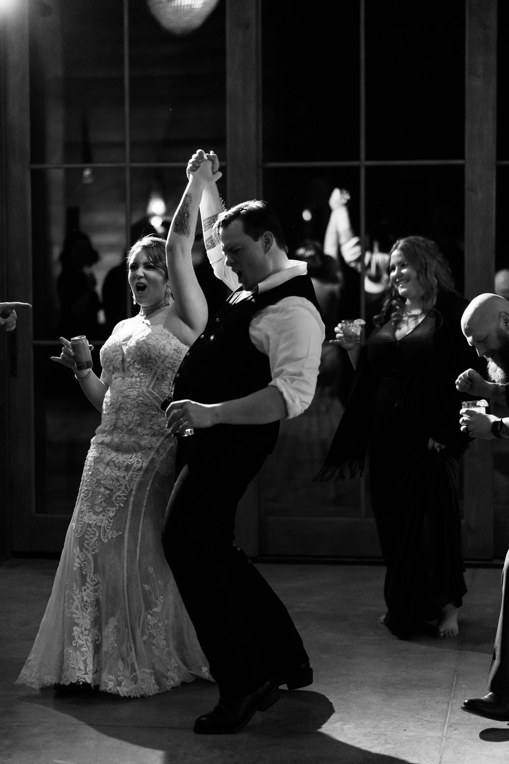 Excited newlyweds dance the night away