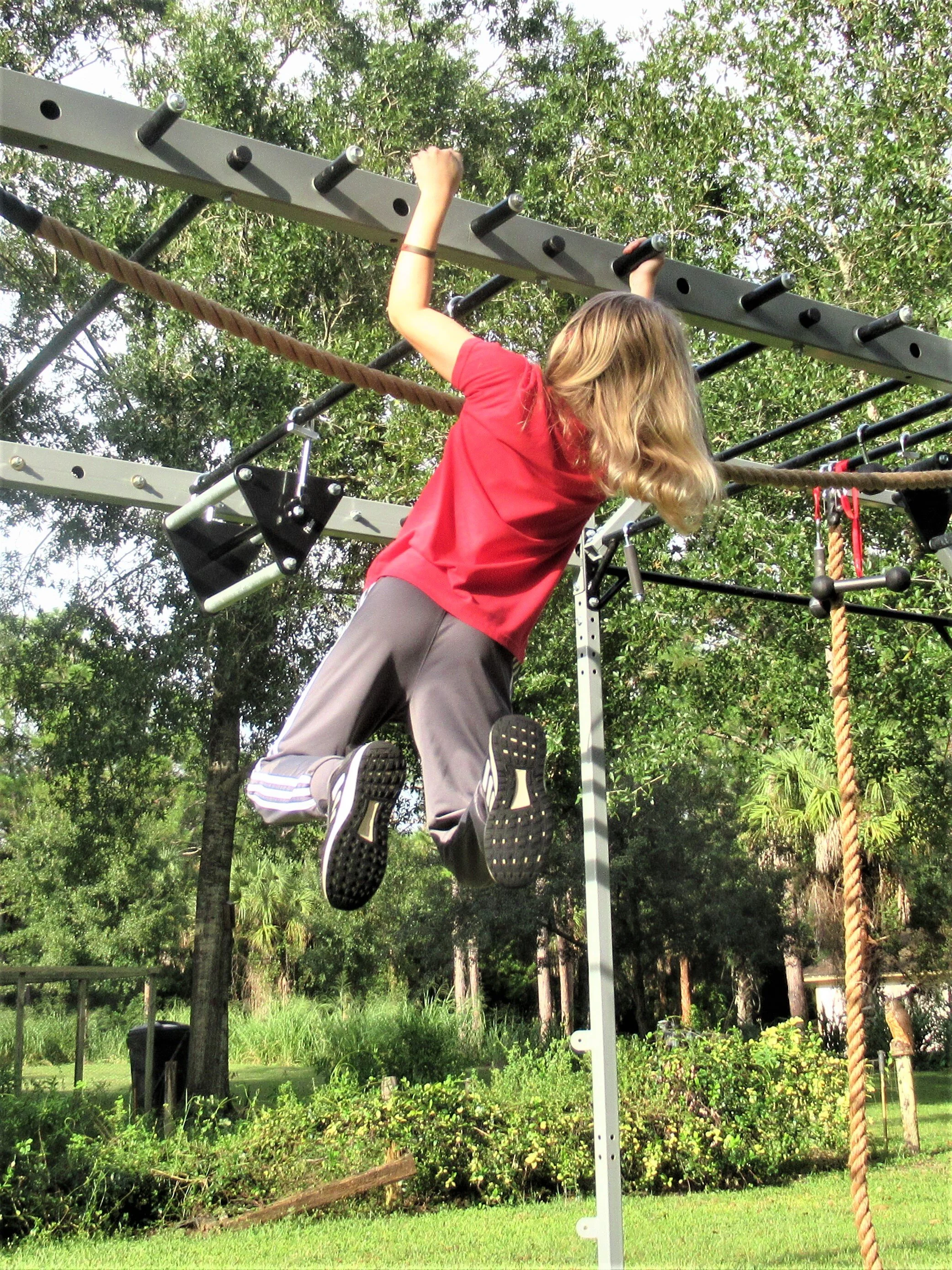 ninja warrior on obstacle pegs (Copy)