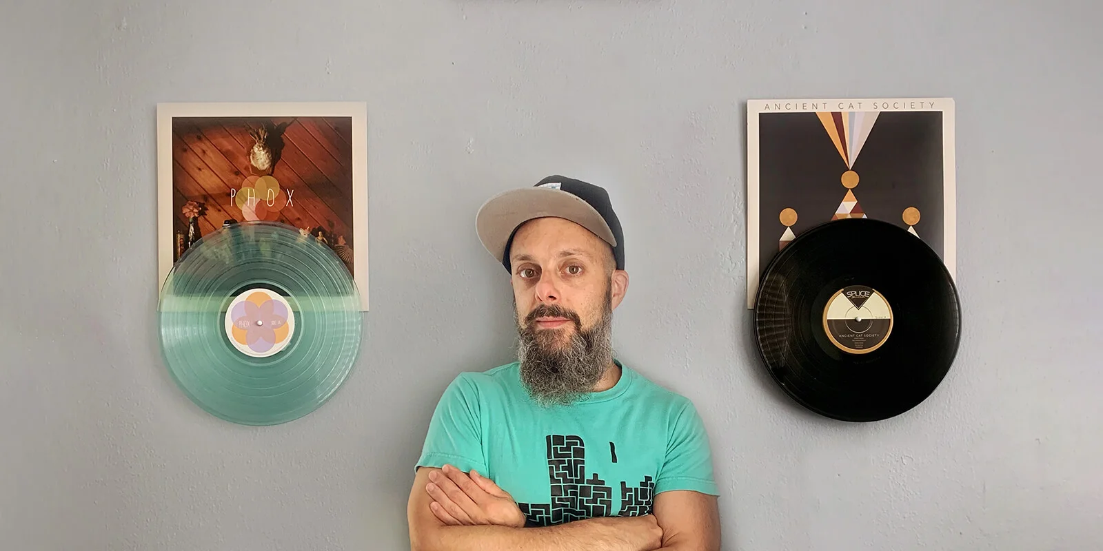 Record Props founder, Tim DeSilva, appreciating a few favorite vinyl record selections. The medium of vinyl provides the means to celebrate both the musicians and the visual artists behind the creation of every album, past and present.