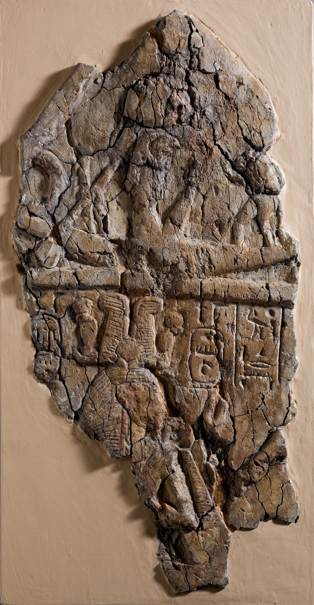 Fragment of Stela depicting a figure labeled 'excellent spirit of Re' facing Ramesses I and Ahmose-Nefertari beneath the barque of Re,ca. 1295–1070 B.C. Collection of the Metropolitan Museum of Art.