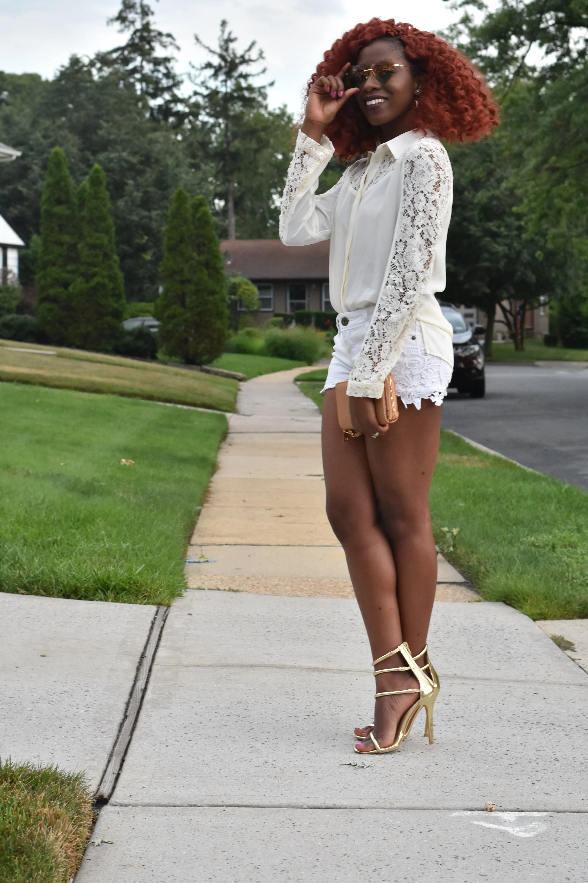 A White Ensemble with Gold Sandals