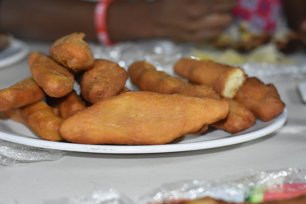  This delicious food right here is called festival - it's basically sweet fried dough. 