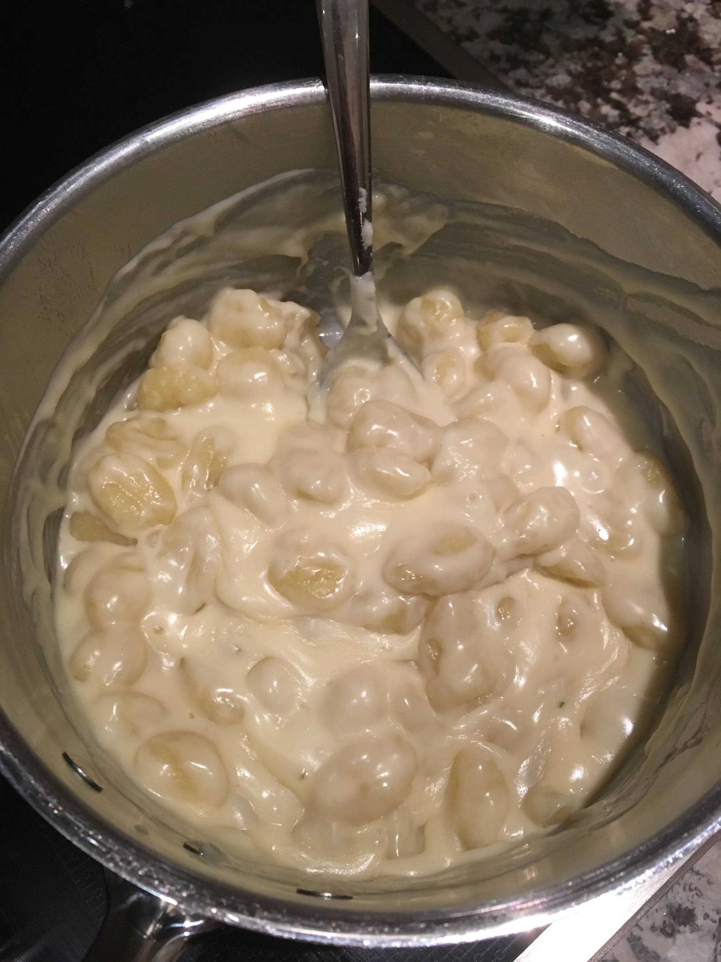 After the gnocchi is cooked, add the cheese = melted goodness