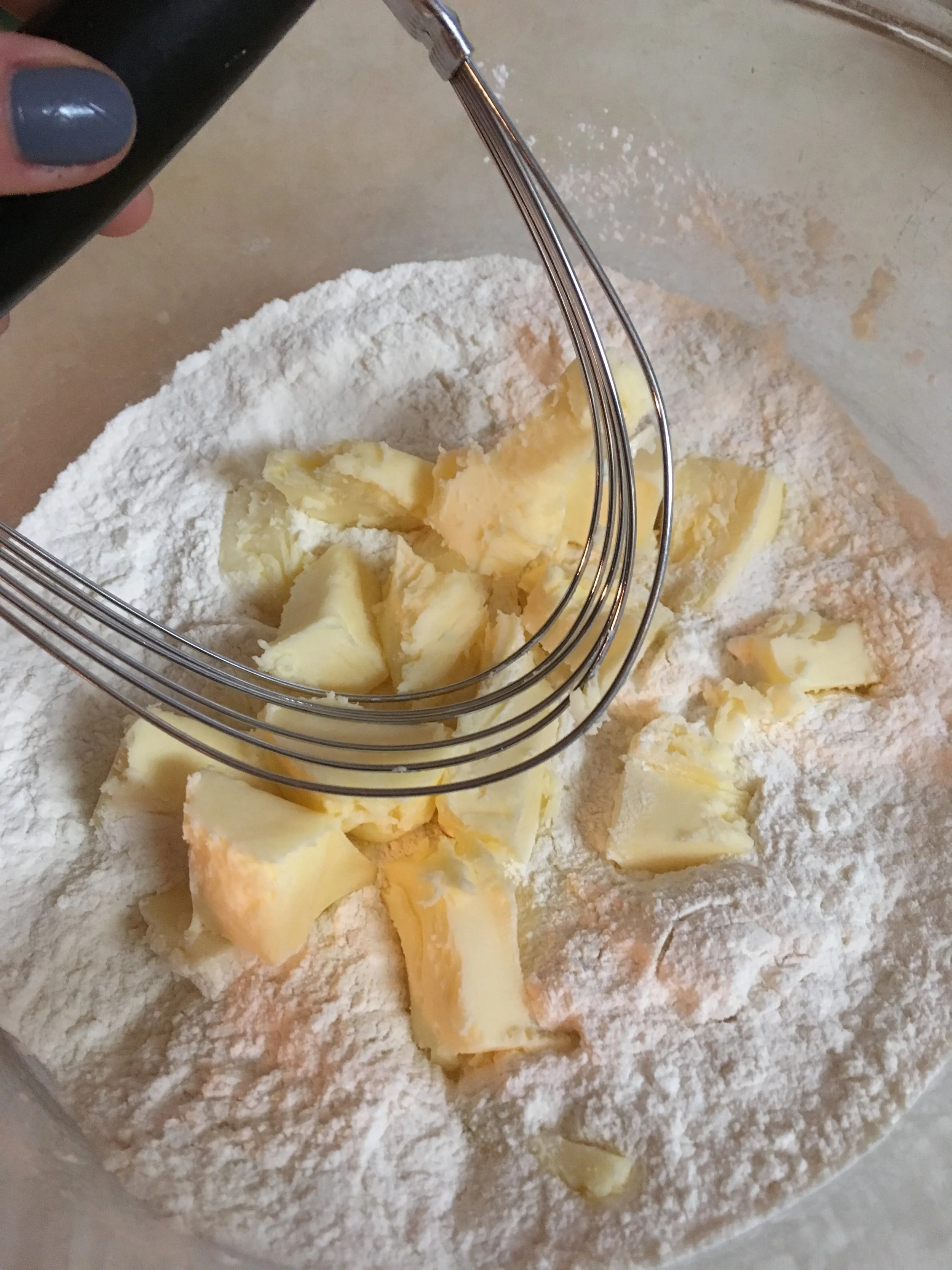 Make sure you cut the butter into the flour mixture, before adding milk