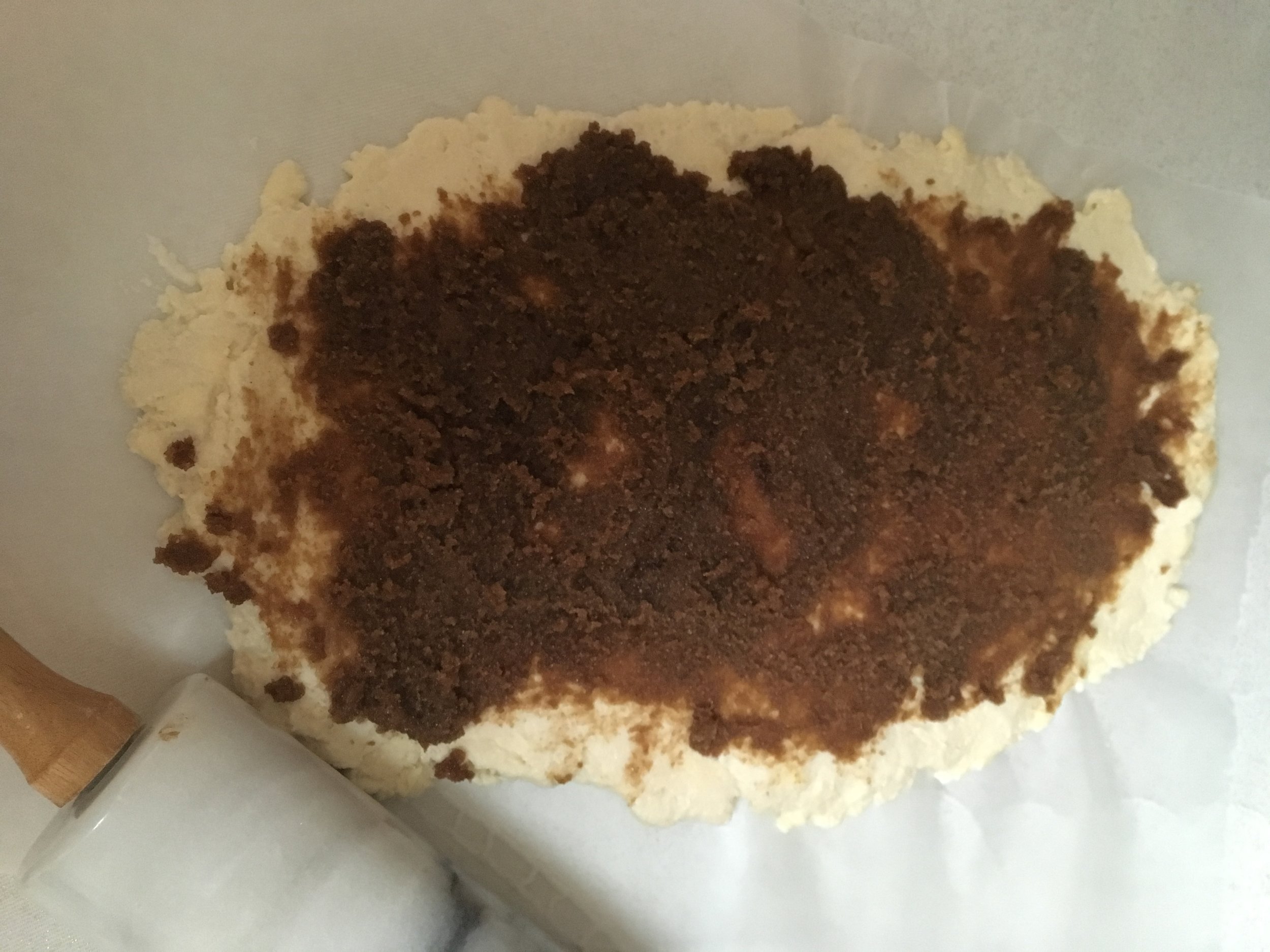 The dough rolled out with the cinnamon sugar inside