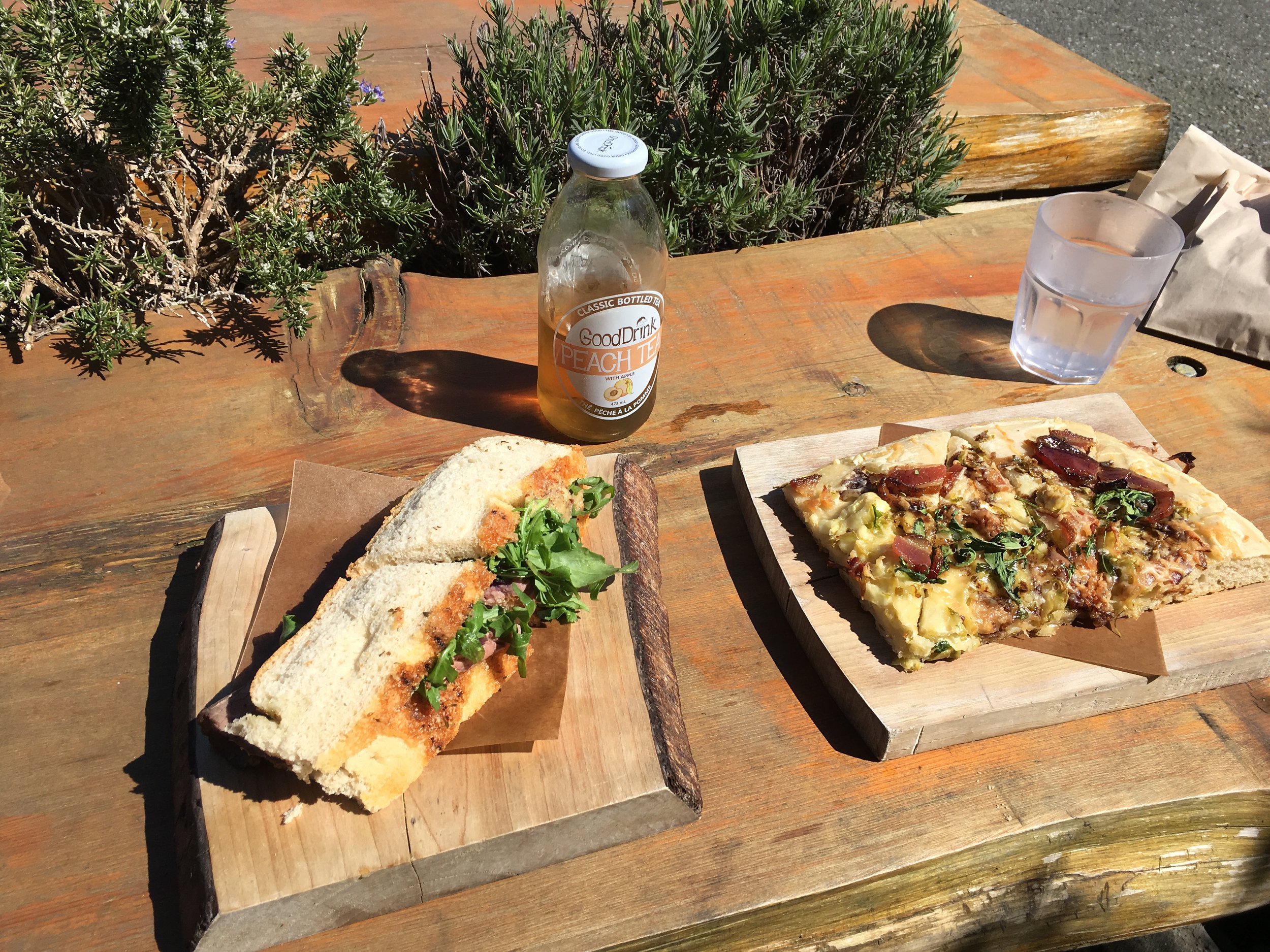 Enjoying the feature sandwich and flatbread after hiking Mt. Ozzard