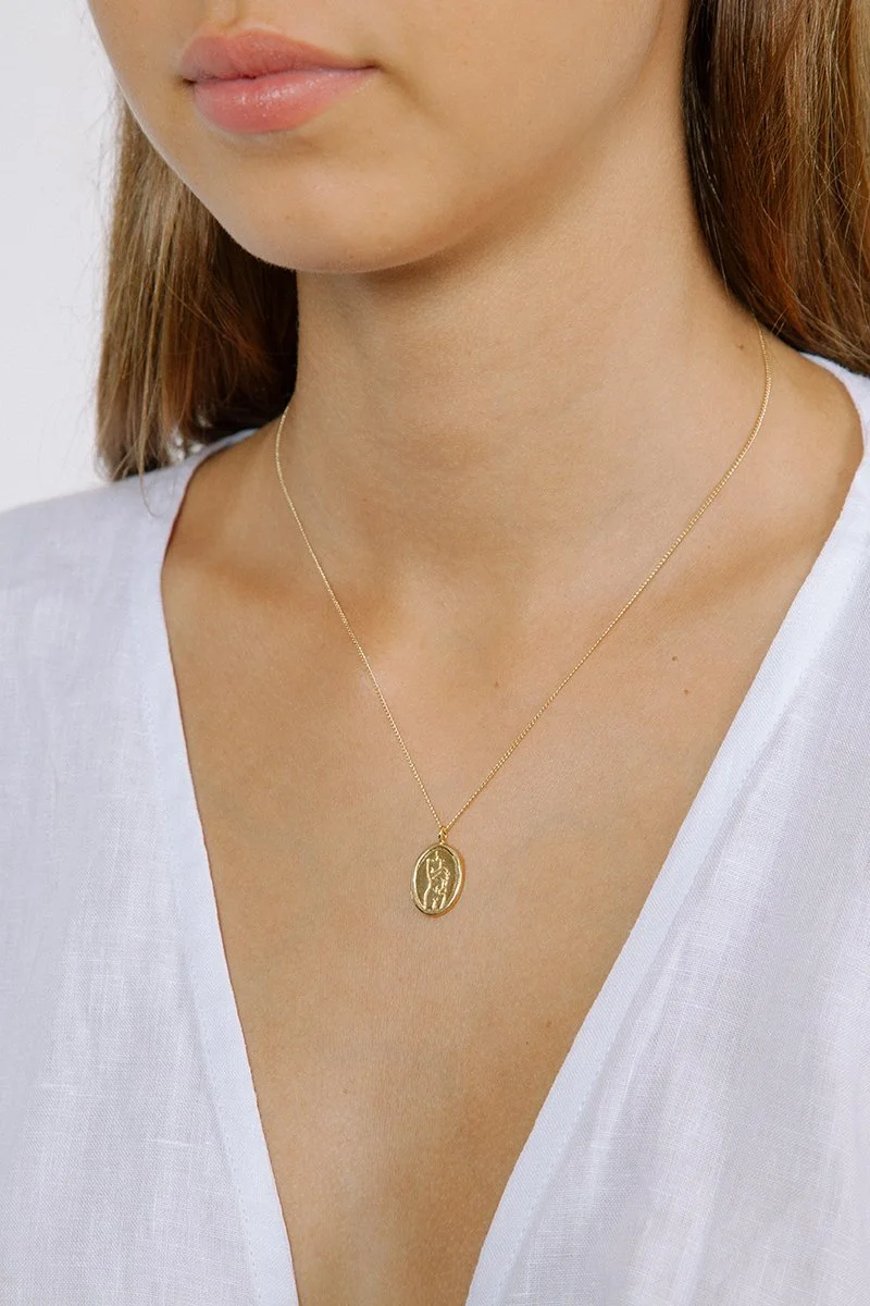 Wolf Circus , Femme Pendant in Gold, $140.00