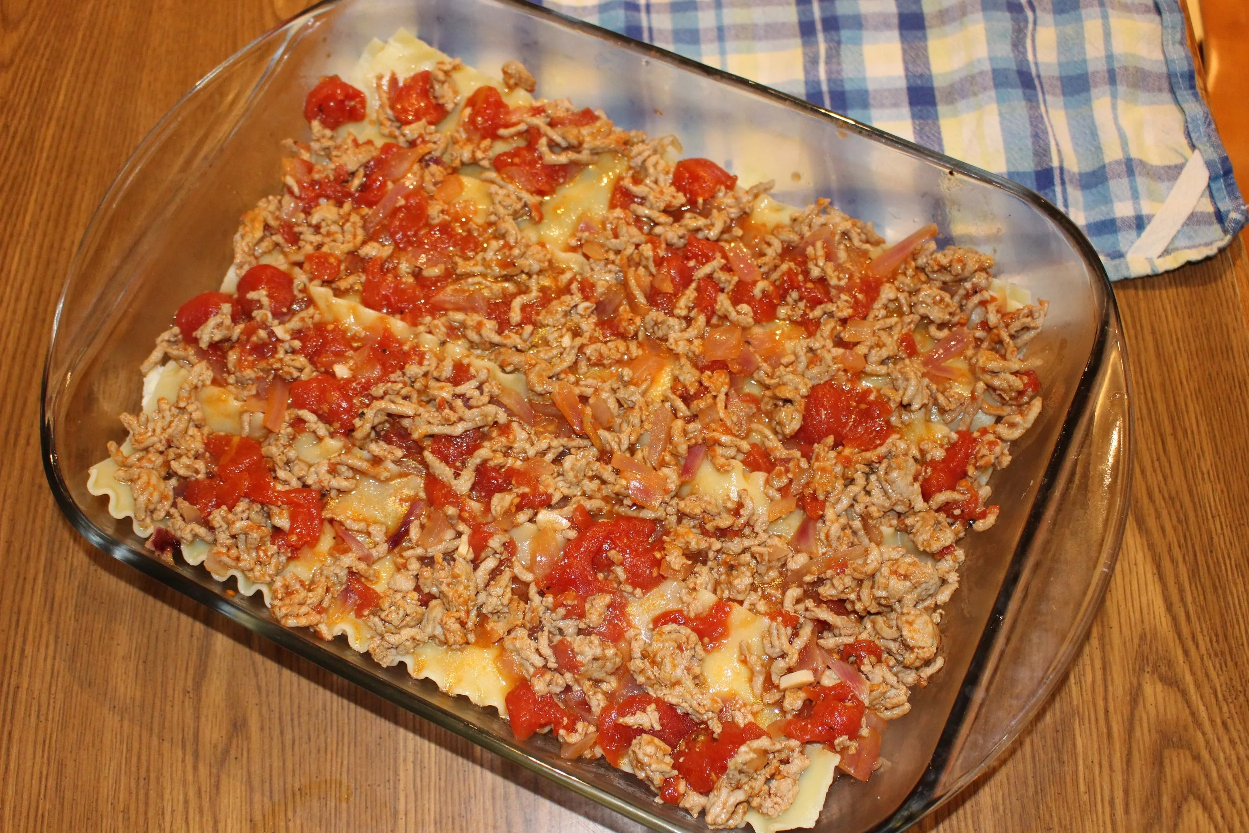 Second layer of ground pork and tomato sauce