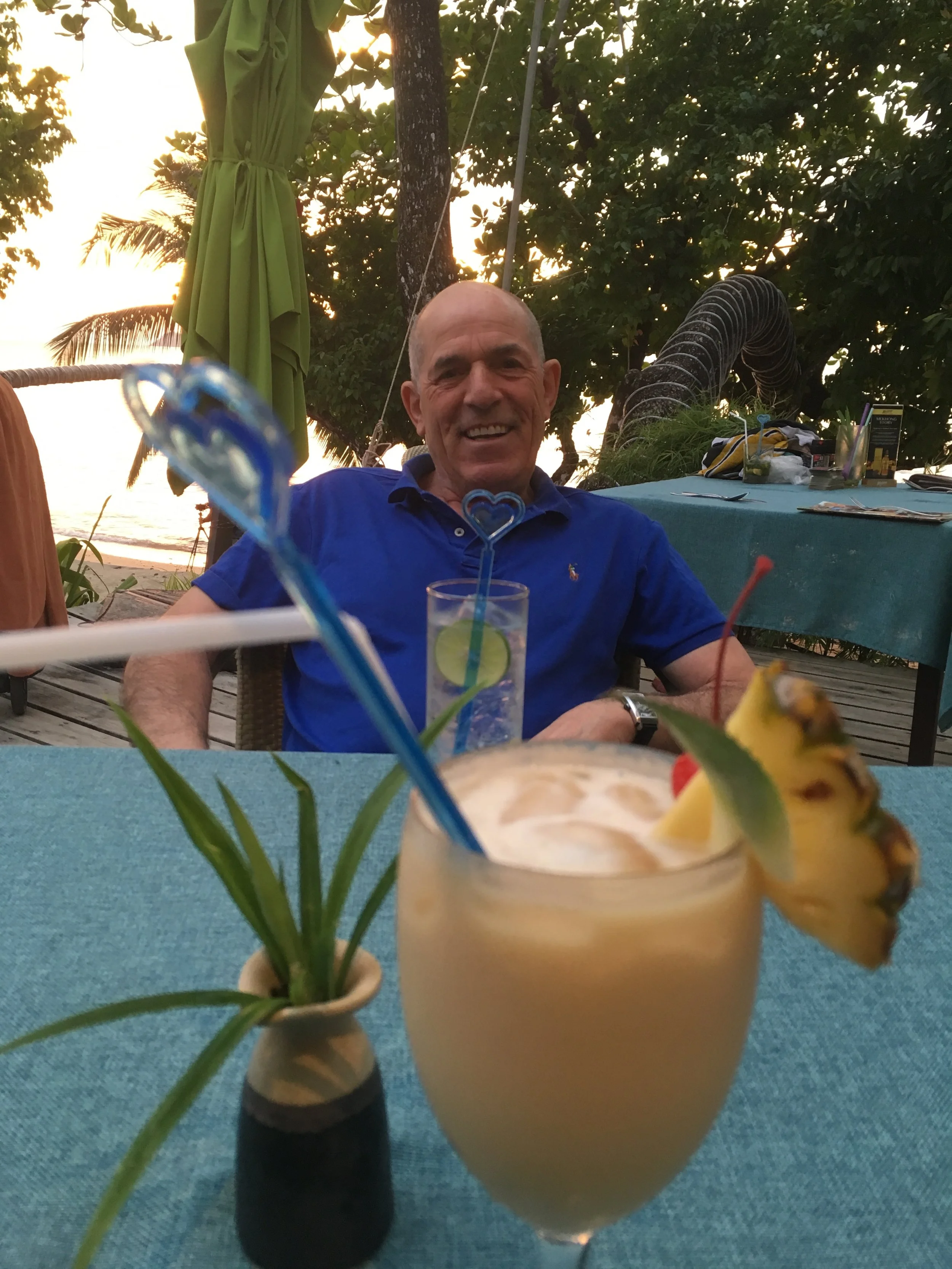 Enjoying a drink with my dad on our last night looking out at the sunset