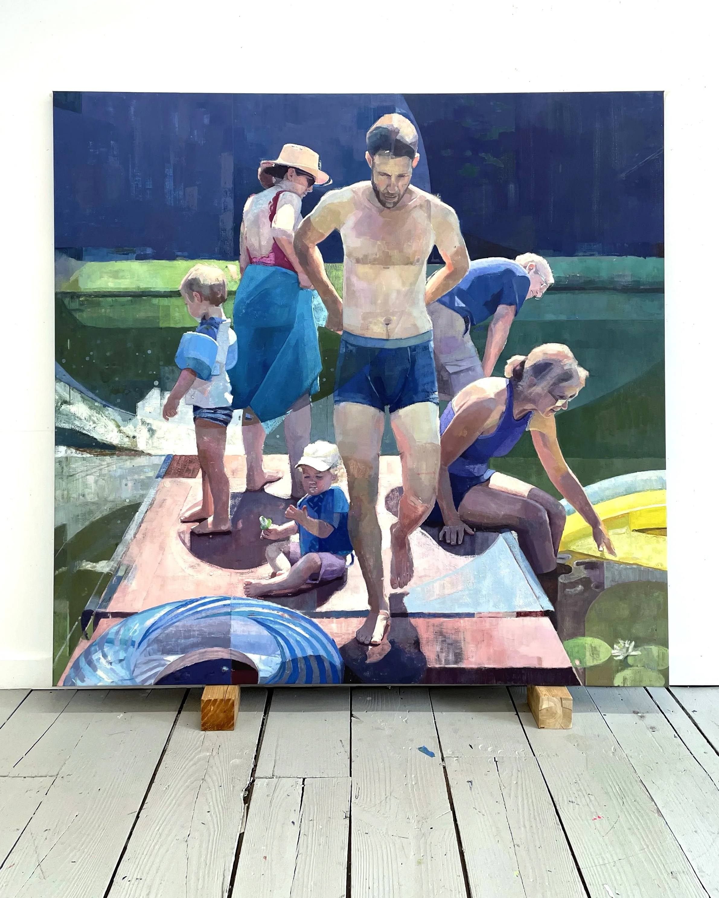 Image of family on dock above water