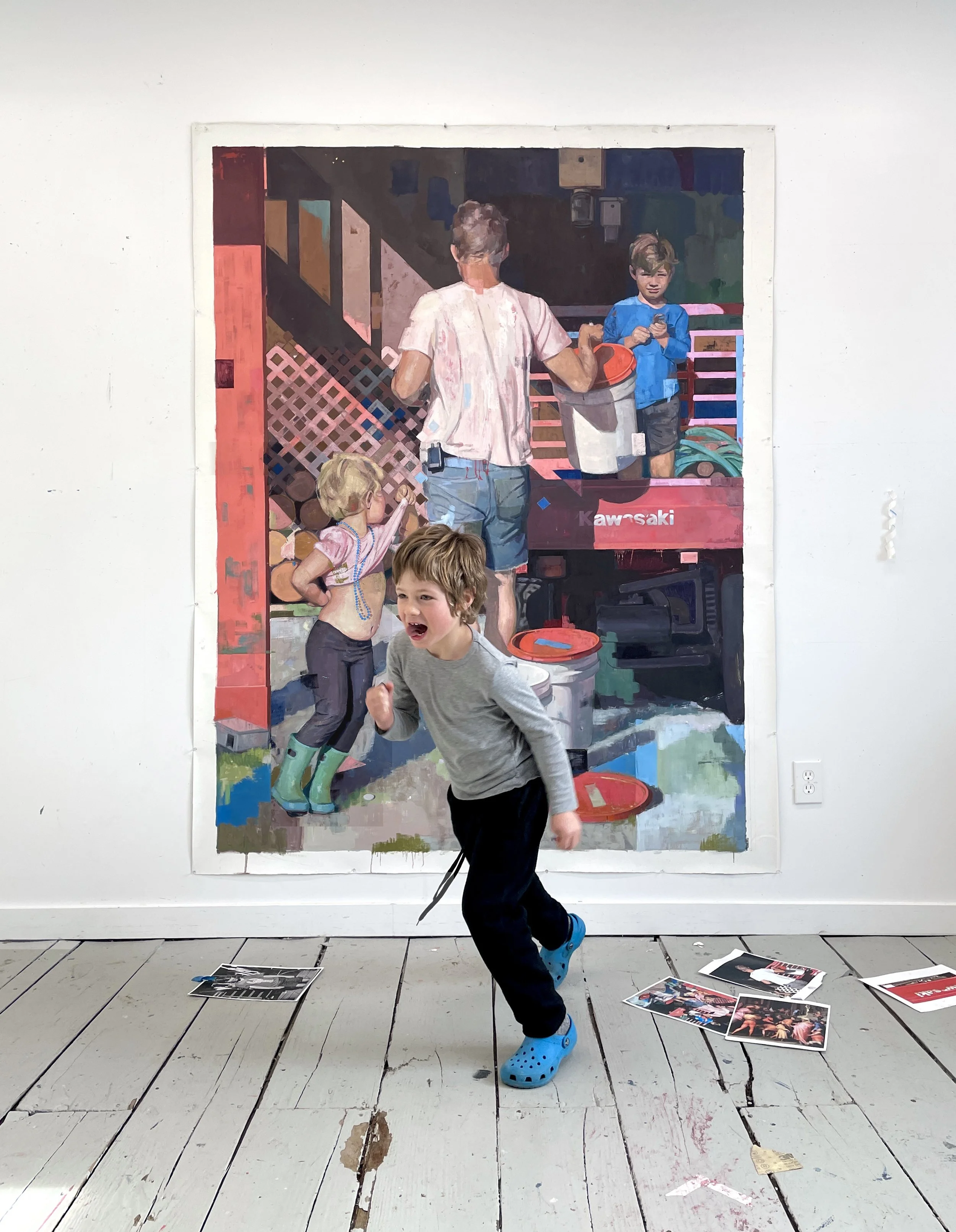 Image of child running in front of painting