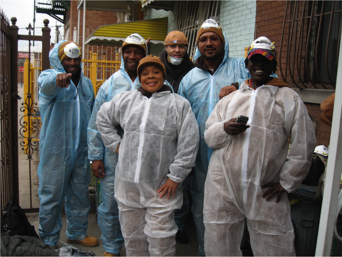 Trainees after completing an energy efficiency home renovation as part of their field training