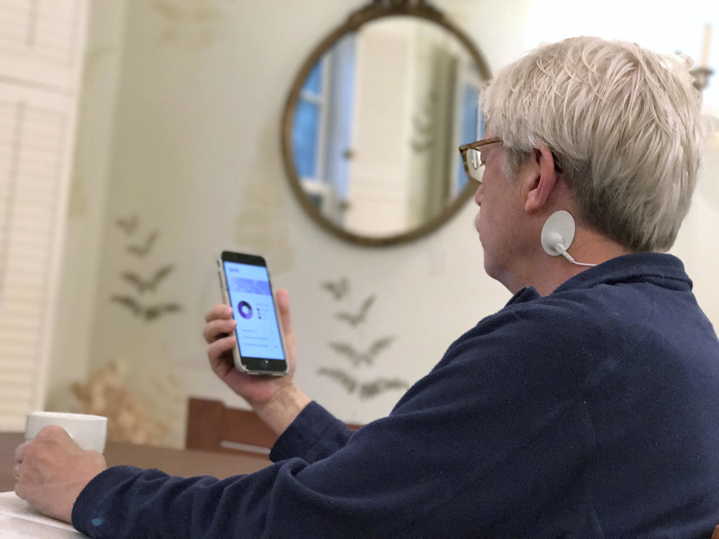 The device has stick-on EEG sensors behind your ears that record and count your seizures anywhere you go. Results are delivered via mobile app.