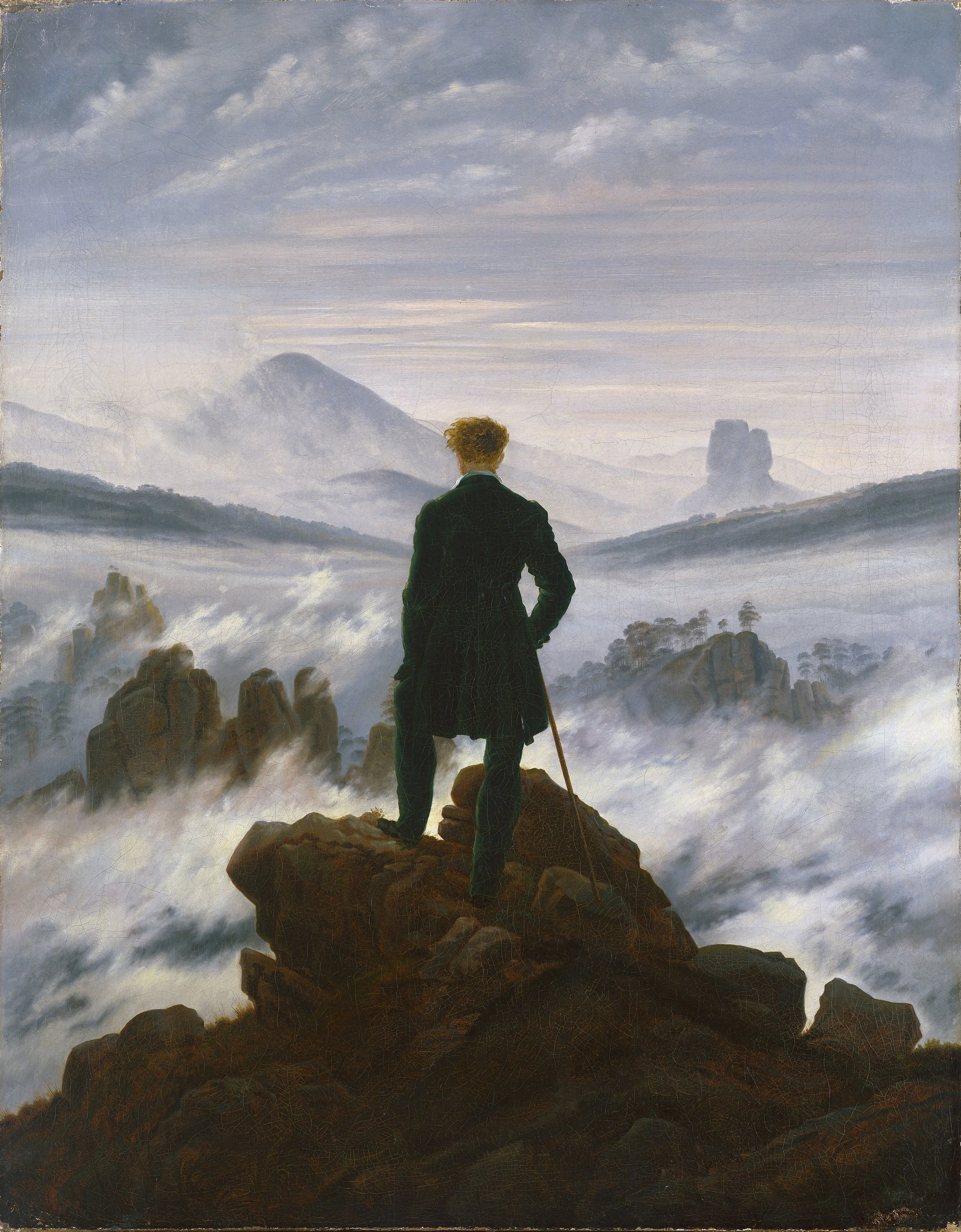 Hand-painted oil painting reproduction of Caspar David Friedrich's Wanderer above the Sea of Fog, featuring a figure standing on a rocky precipice overlooking a misty mountain landscape.