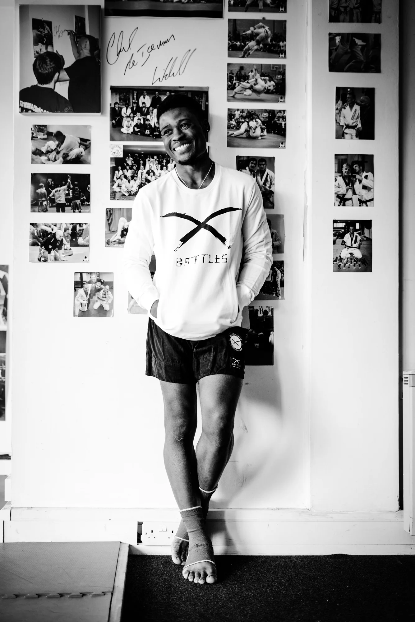 Josh wears ‘Dual Swords’ sweatshirt and Muay Thai-style shorts by Battles of London