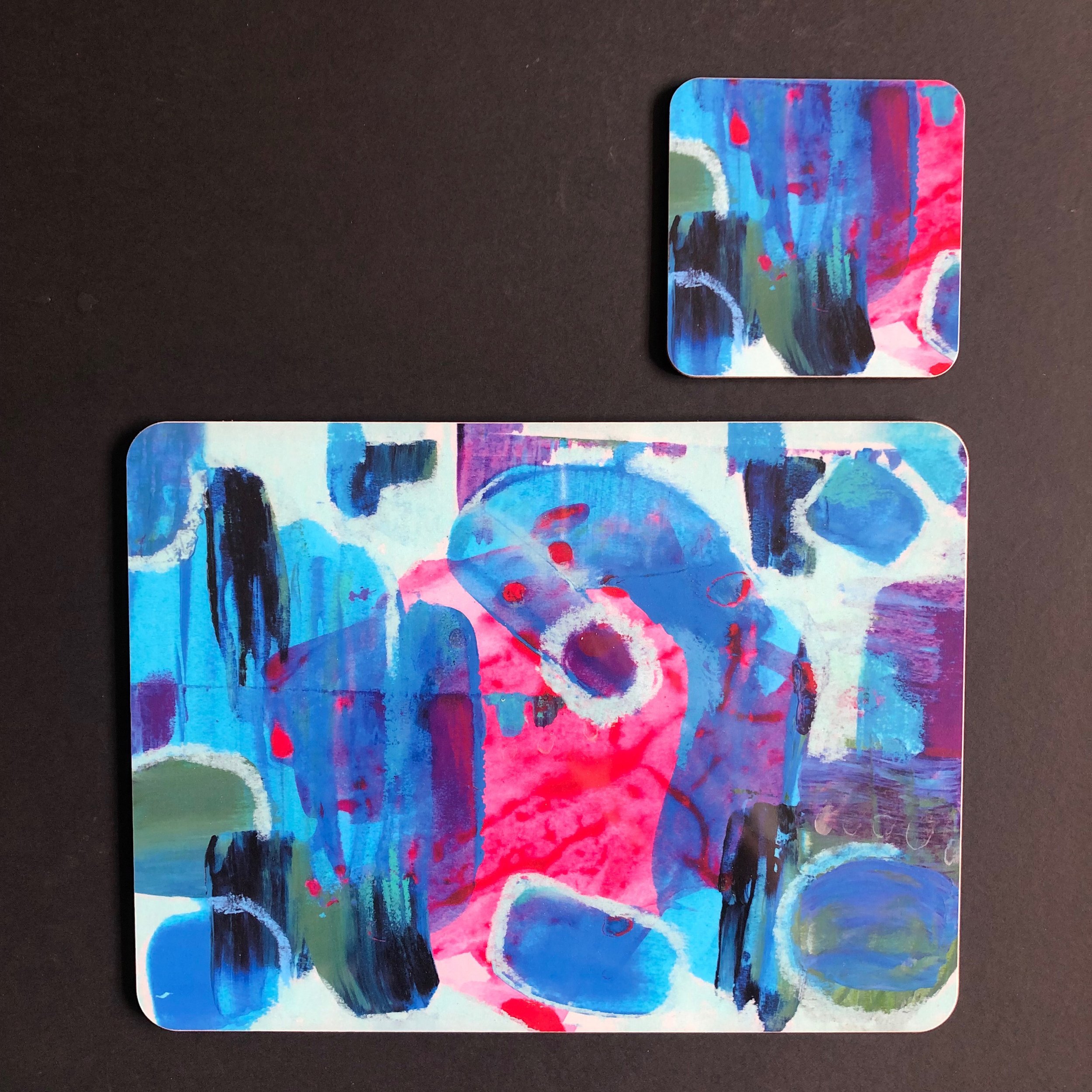 Beautiful Blue and aqua rectangular cork backed placemats. High quality