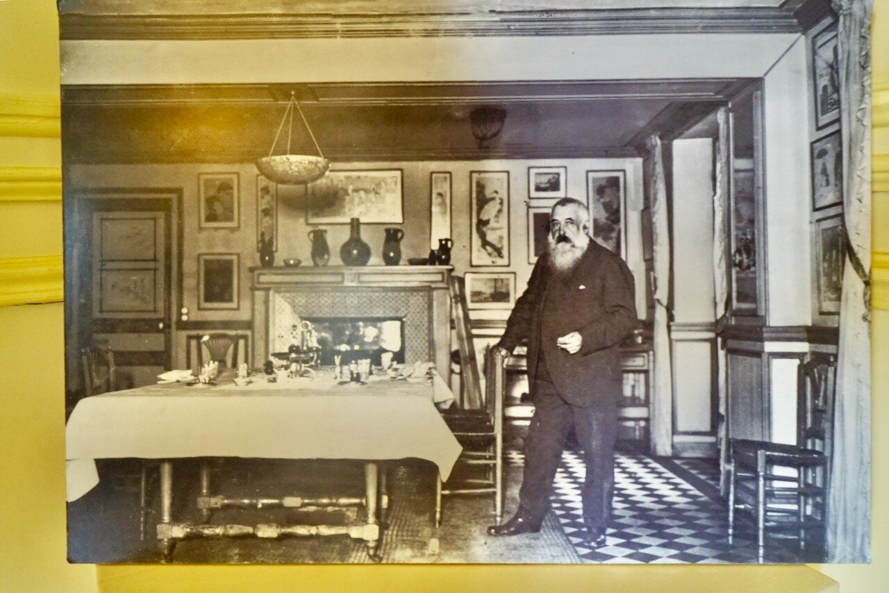 The man of the house in his dining room