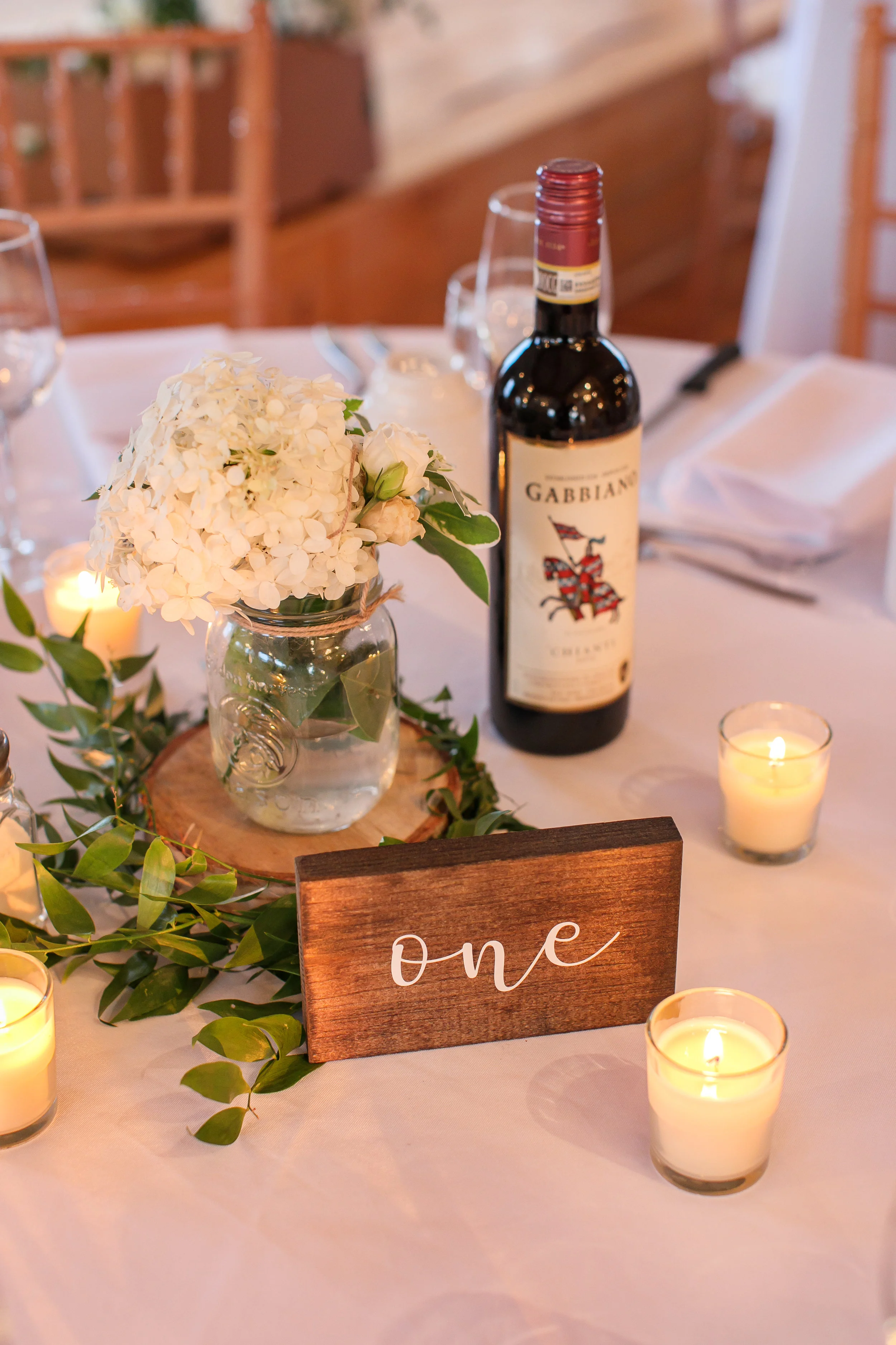 Wooden script table numbers Photo by Brady McCloskey Photography