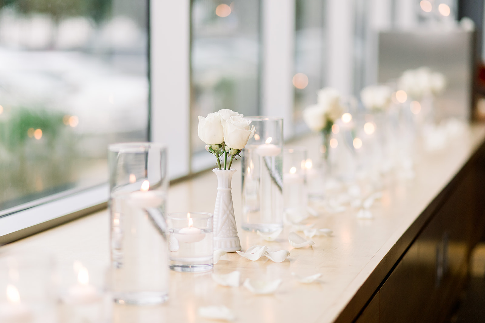 Varying size and style vintage milk glass vases Photo by Caley Joy Photography