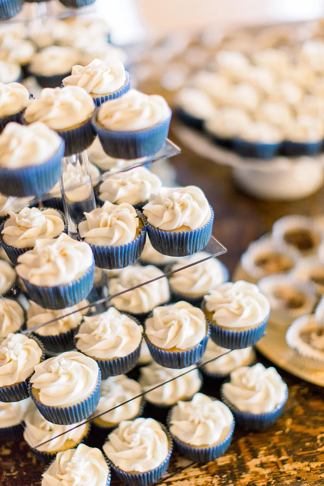 Four-tier acrylic cupcake stands Photo by Caley Joy Photography