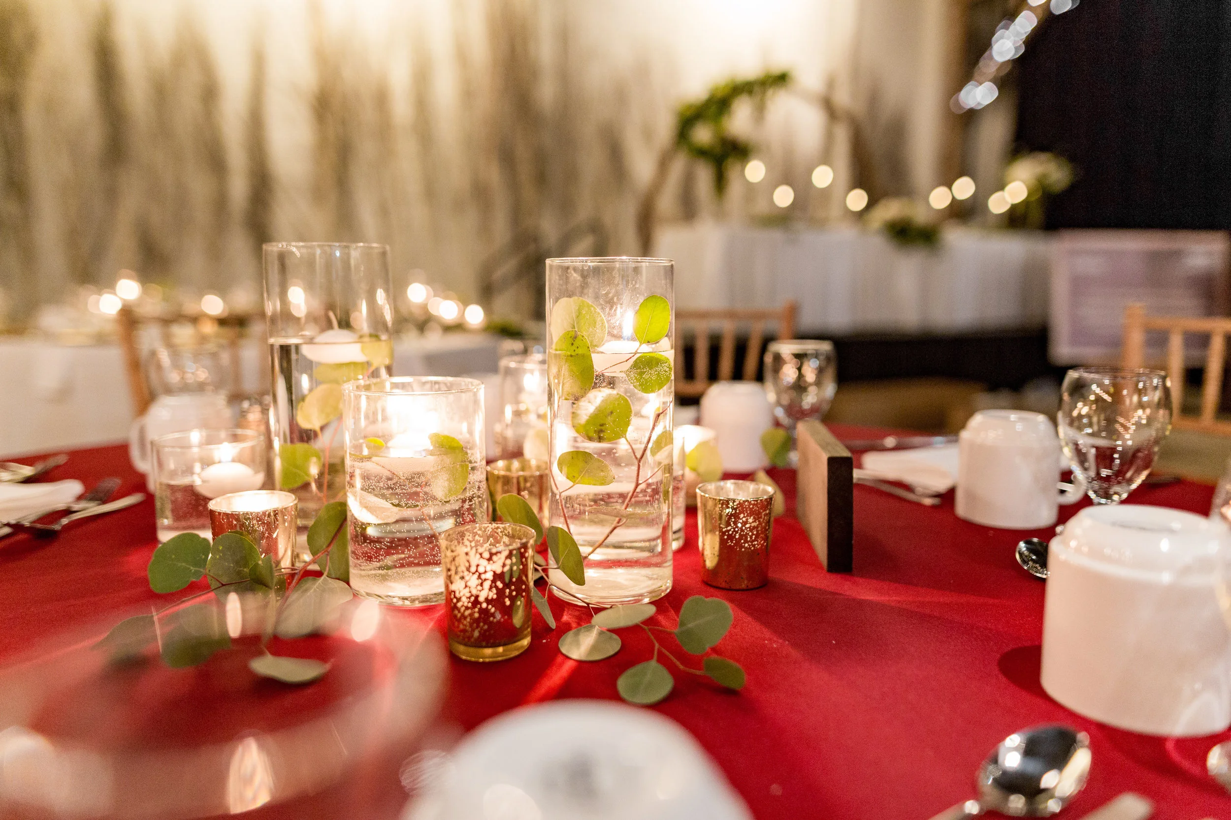 Assorted size cylinder vases Gold mercury glass votive holders Photo by Jenna Rachelle Photography