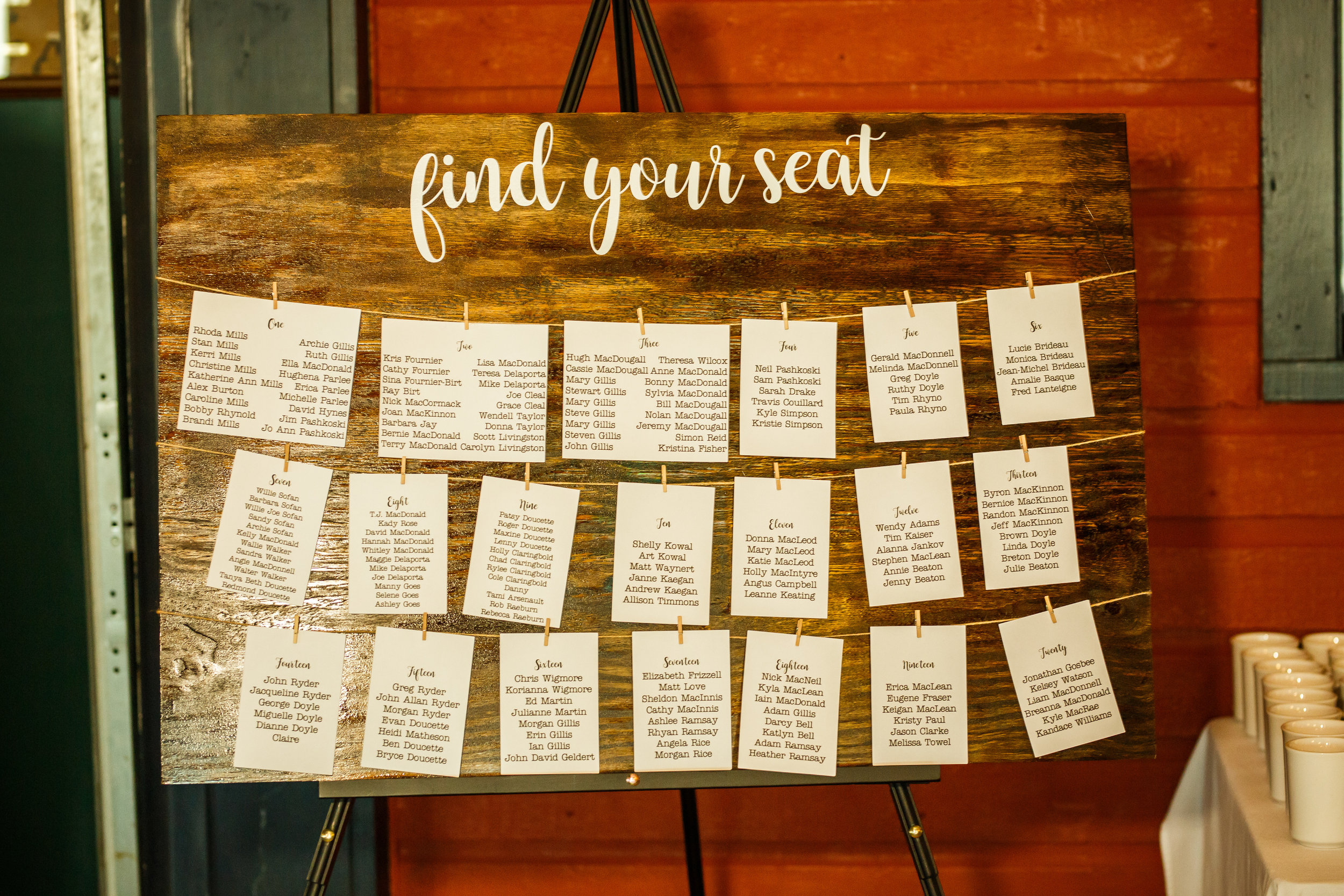 Large dark stain seating chart Photo by Simon Reid Photography