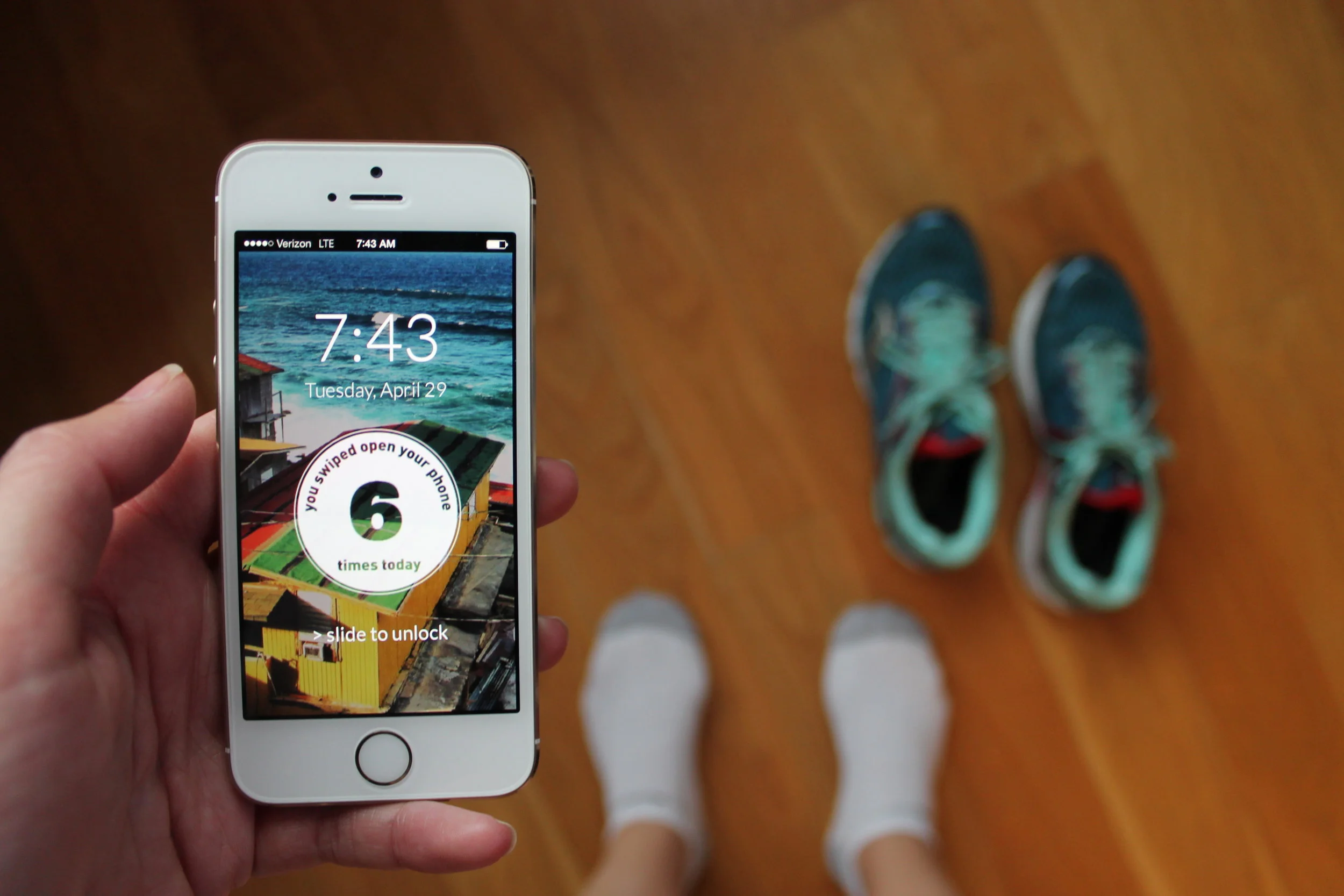  A counter on the lock screen keeps track of how often the user has opened their phone so far that day.