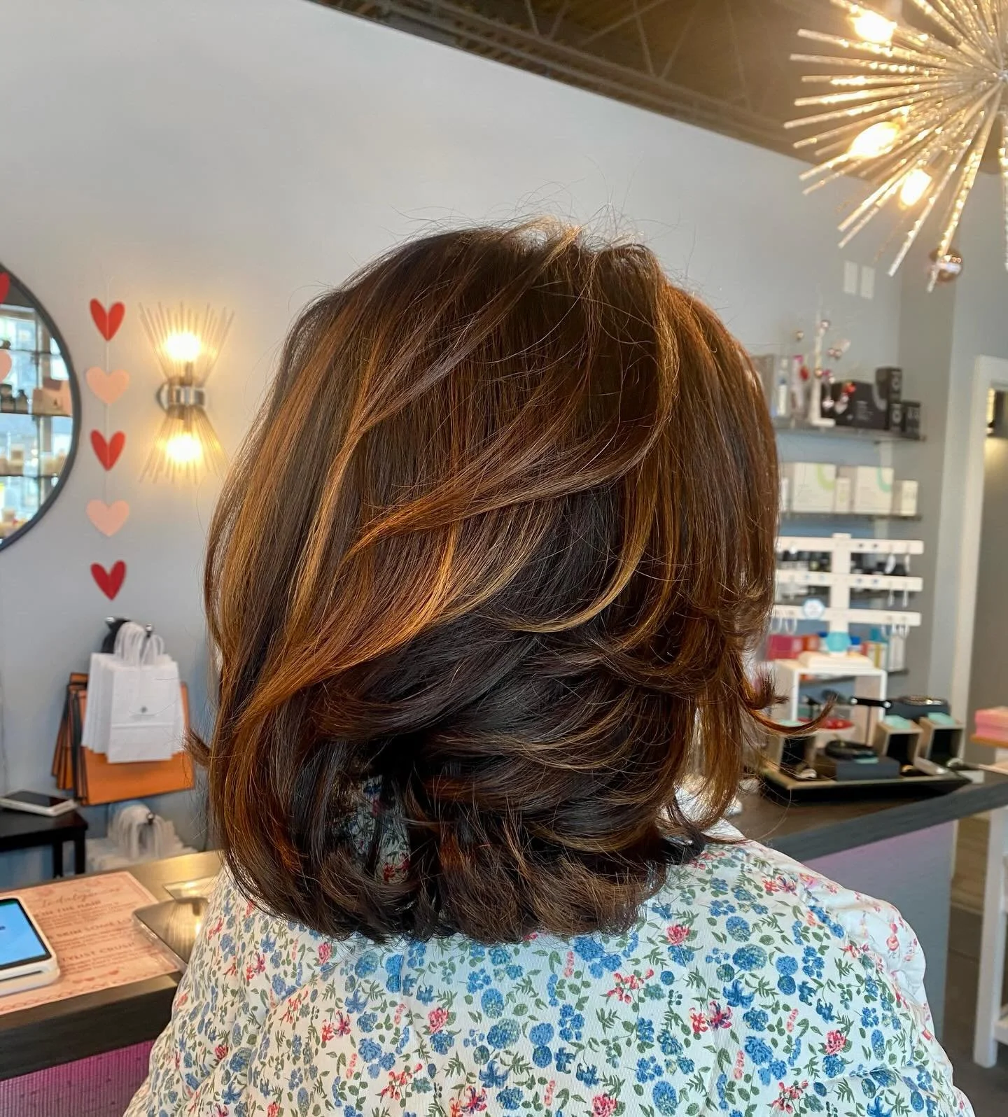 Love is in the air&hellip; and in this hair 💗✨ Bethany worked her magic with a partial highlight, fresh cut, and the perfect blowout. Soft dimension, healthy shine, and a whole lot of glow. Book your appointment and fall in love with your hair all o