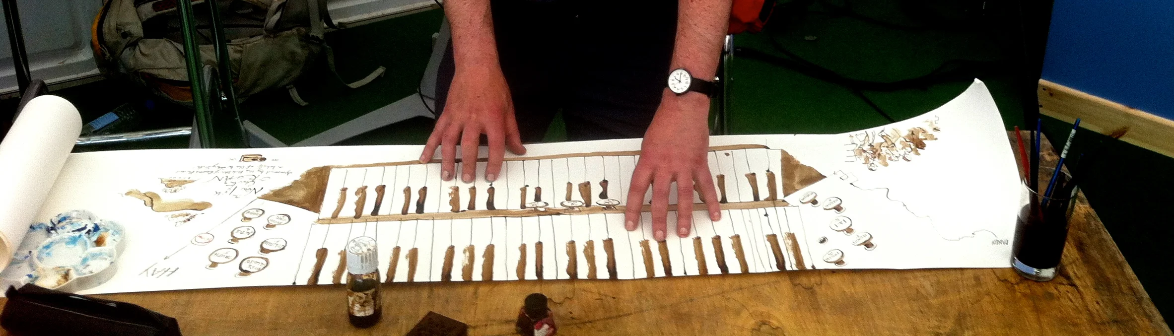 Chris Glynn creates a hand-drawn keyboard during a Coleridge talk at Hay Festival 2016