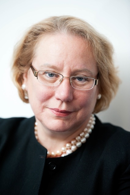 Still fighting for equality, still in her best pearls