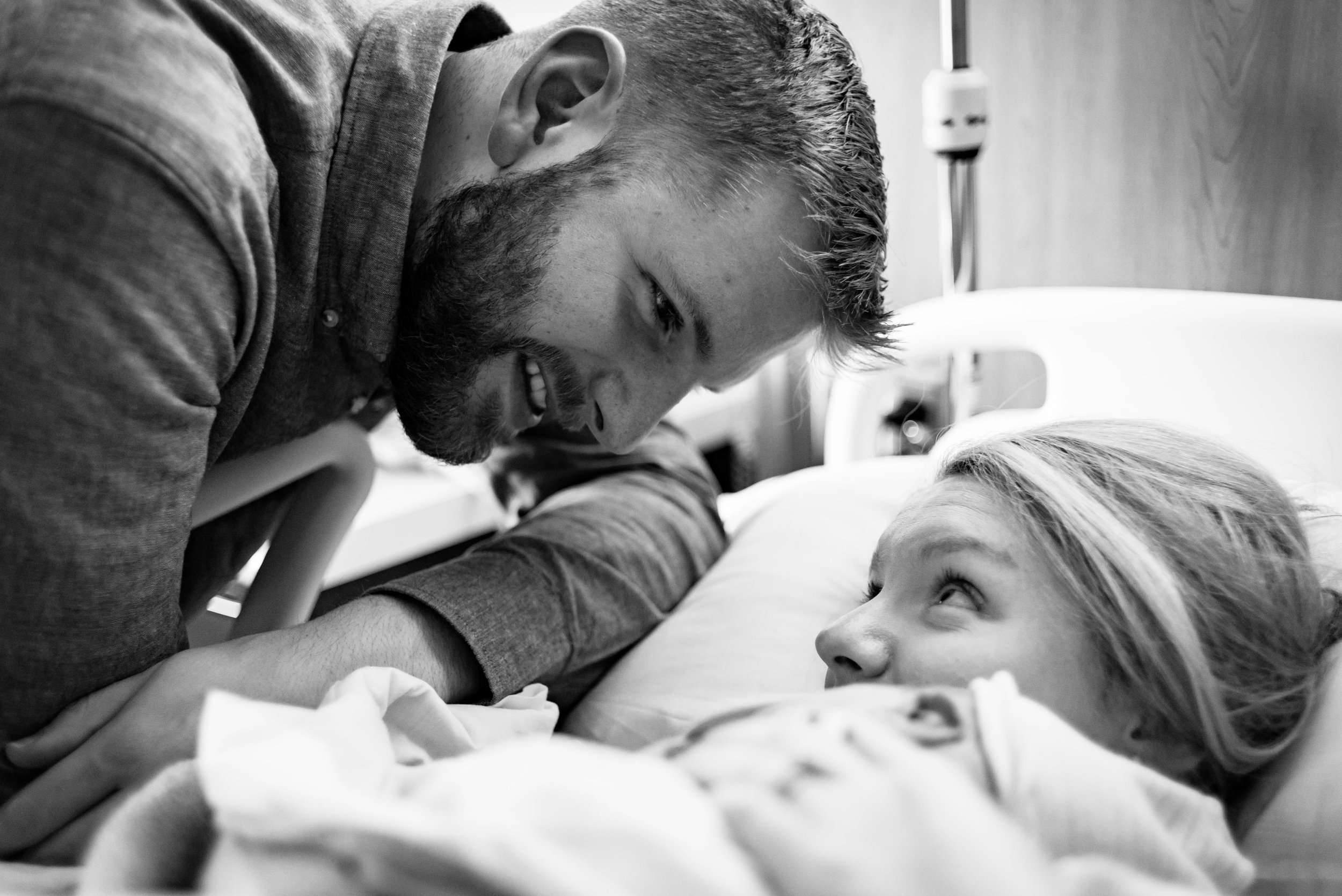 i love how she's watching her man take in their baby