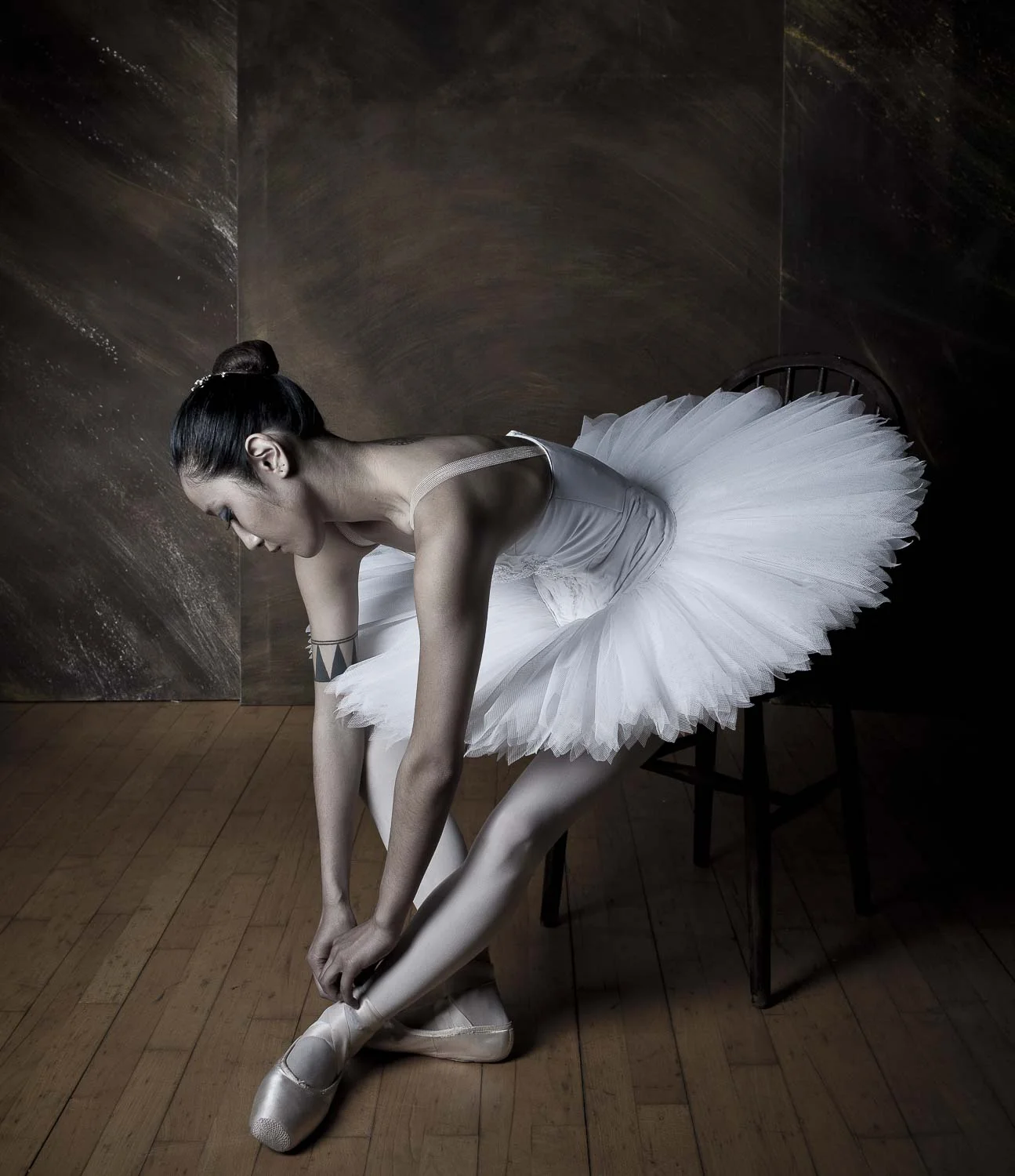 Portraits have the ability to live and remain with us in a beguiling two-dimensional afterlife—long after the click of the shutter. More than just a record, portraits are the result of an interaction between the photographer and the subject—both of whom contribute to the portrait's form and content.