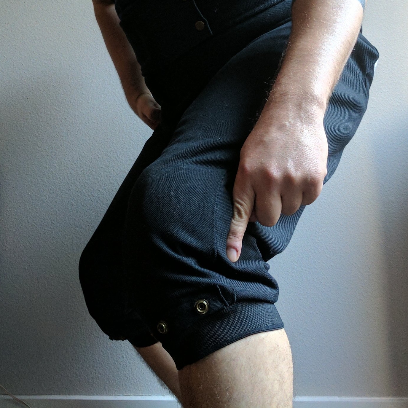 It's not obvious in the photo due the pants being baggier, but that's my kneecap that I'm touching. I did not move the pant, I only bent my knees.