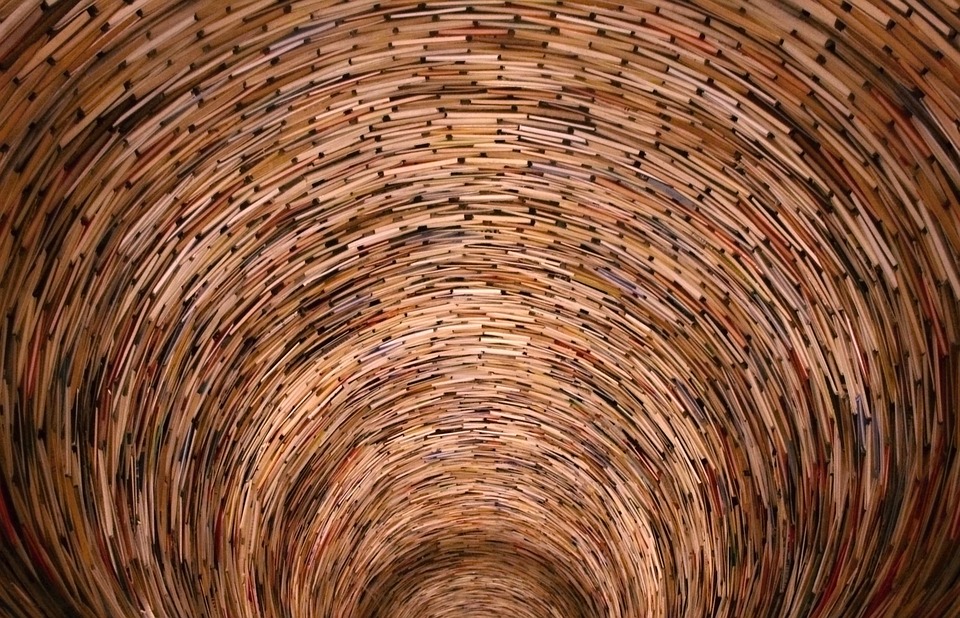 Oh look, a vortex of magic! Looks like someone's TBR pile got a little out of control. Photo Credit: Michal Jenik