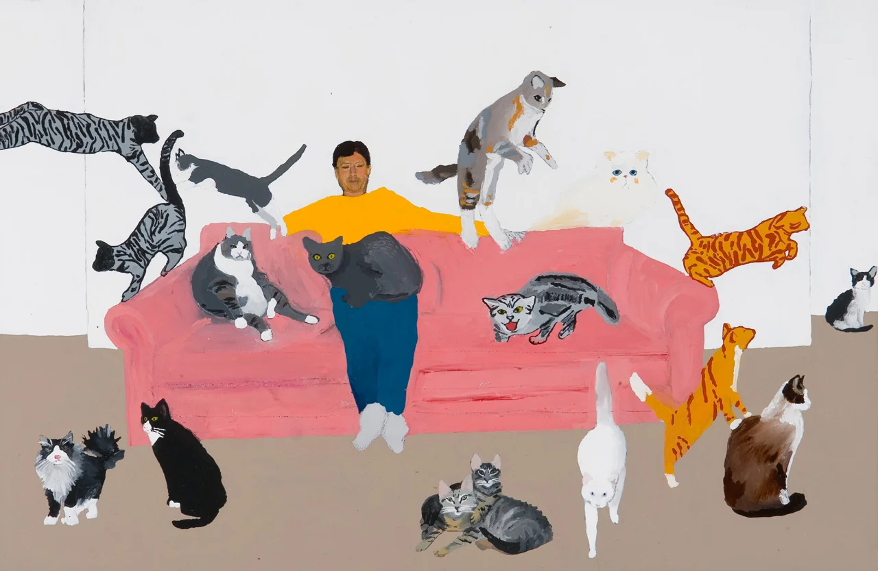 Russ with 15 of his cats