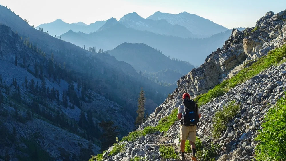 Trinity Alps - CLICK HERE TO SIGN UP Number of participants (tickets): 9 Ticket Price: FREE! (with deposit required) Trip Description: Howdy New Wildings! Come join us and your fellow first years for some Intermediate Backpacking in the Trinity Alps. The Trinity Alps mixes the beauty of the Pacific Northwest with the magnificence of the Sierra mountains, so they’re a perfect place to go to get to know the California wild. We will complete the Four Lakes Loop trail, backpacking through alpine meadows, crystal clear lakes, and green, green forests. Don’t be fooled, there’s a whole lot of elevation to gain, so this trip is not for faint of heart. This trip is perfect for those who love seeing the stars, making new friends, and adventuring in the great outdoors. We strongly recommend previous backpacking experience or extensive hiking experience. We will depart from campus the morning of Wednesday, September 18th and drive north to Shasta- Trinity Alps National Forest, then hit the trails to hike 5 miles with 2,000 feet of elevation gain to our campsite at Echo Lake. On Thursday, we’ll traverse mountains, lakes and meadows on a lovely 7 mile hike, reaching Siligo Meadows. On our last day, we’ll trek the final 7 miles back to the trailhead, then drive back to Santa Clara. We’re stoked to adventure with you as you start your time here at Santa Clara! Get up, get out, get wild! Activities: Hiking/Backpacking, Camping Experience/Fitness Level: Intermediate Backpacking; Backpacking experience is highly recommended; Hiking experience and being in good shape is a must as well we be covering 5-6 miles a day with large elevation gain. Leaders: Kirsten Dodroe, Pierce Klinke, and Nick Keenan