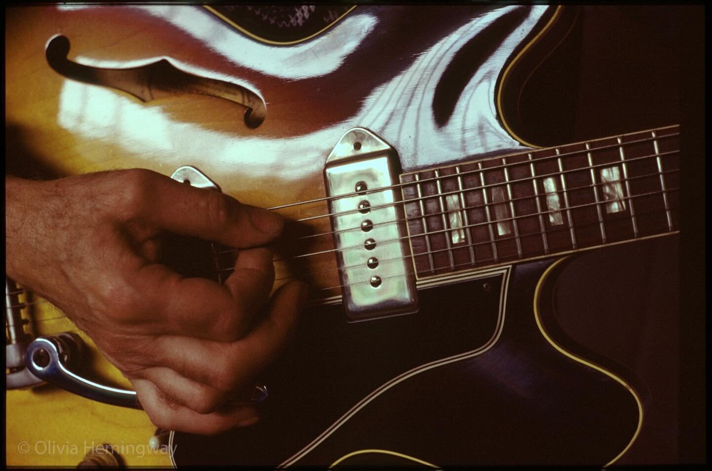 My dad playing his Gibson - he liked this picture 🤍 I took it on 35mm film. Image now with @millennium_images - I can hear him now saying &lsquo;fame at last Olivia&rsquo; 

#gibson
#photoarchive 
#guitarplaying
#dad
#josephhemingway
#guitar 
#mille