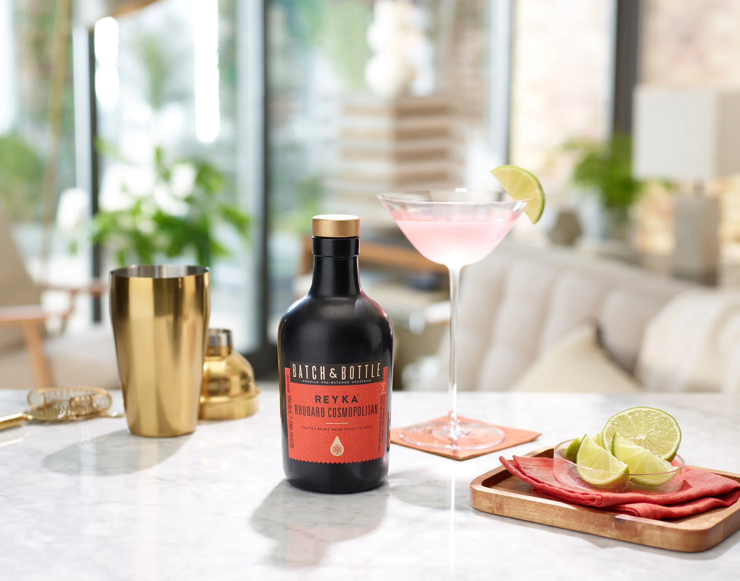 Reyka Rhubarb Cosmo - Bottle and Cocktail RET.jpg