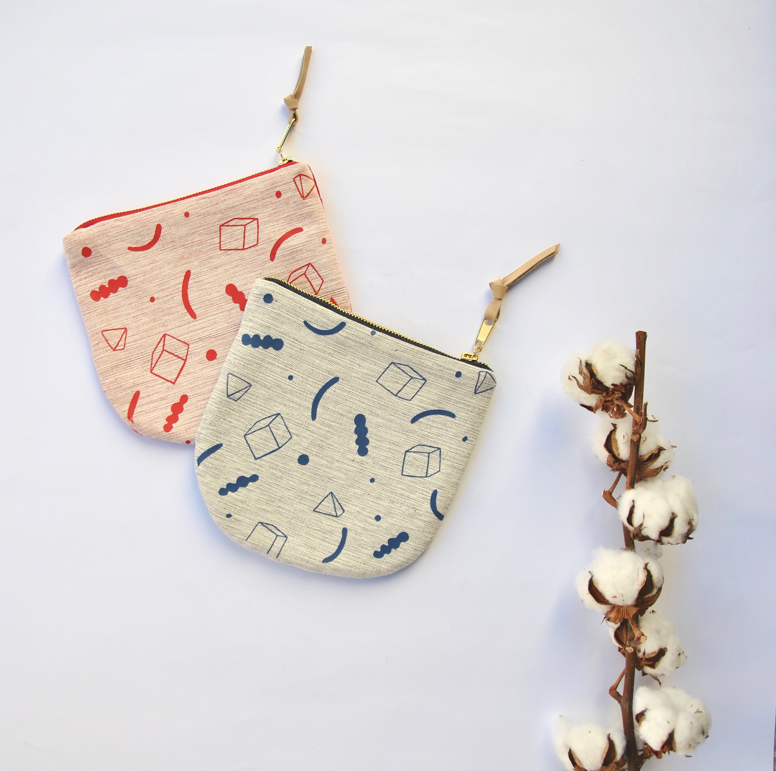 Abstract zipper pouches by illustrator Daphne Christoforou.