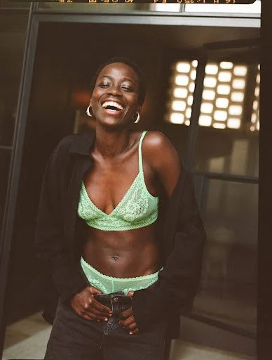 Olivia laughing fluro bra.jpg